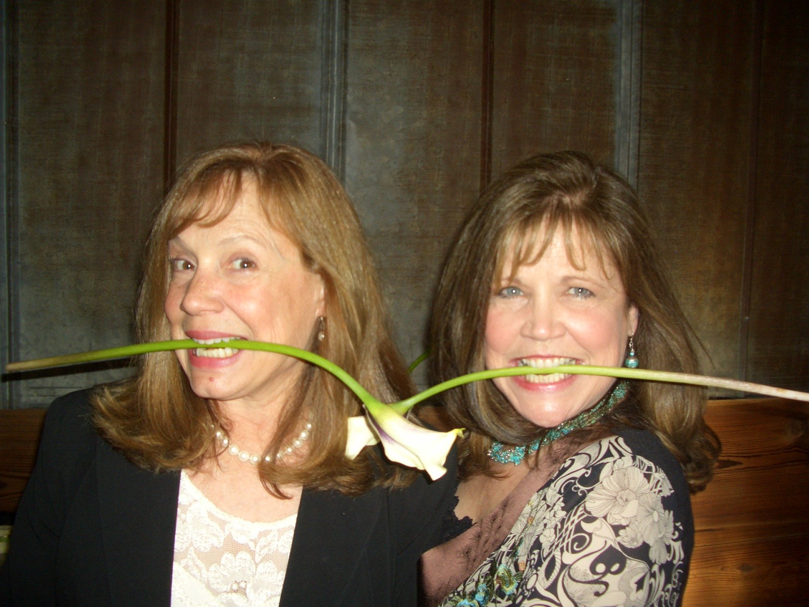 janet and me with flowers in teeth.jpg