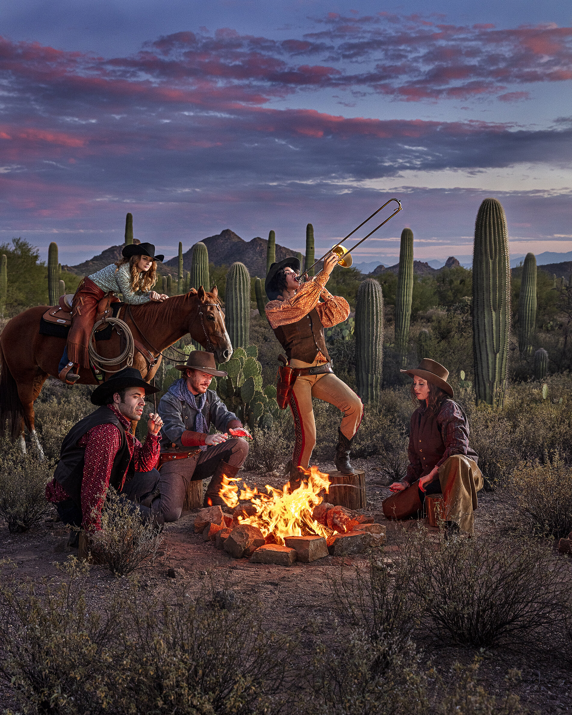 Cowboys and Cowgirls around the campfire