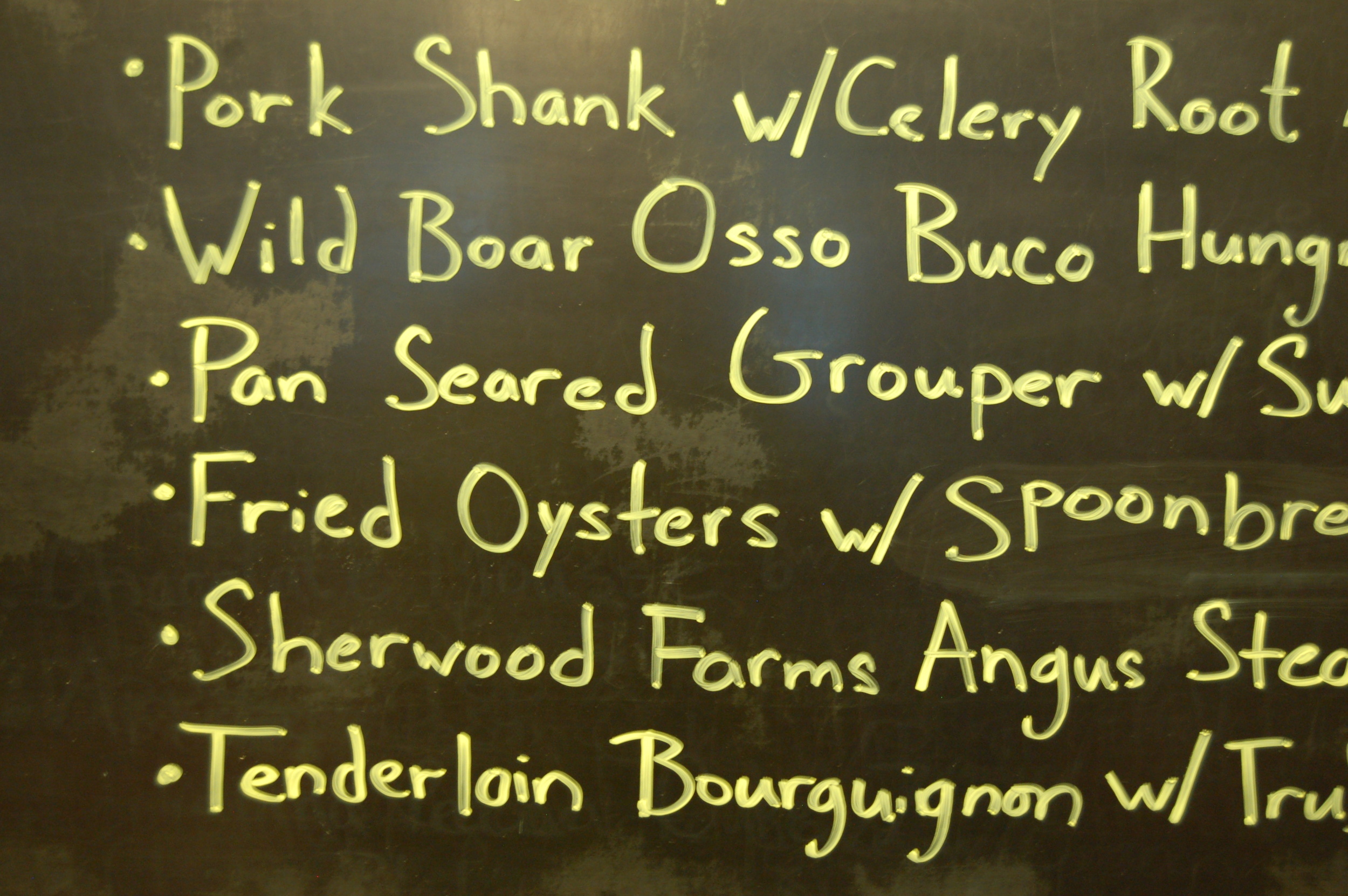 What you really want to know about the menu at Tastings of Charlottesville is on their blackboard.