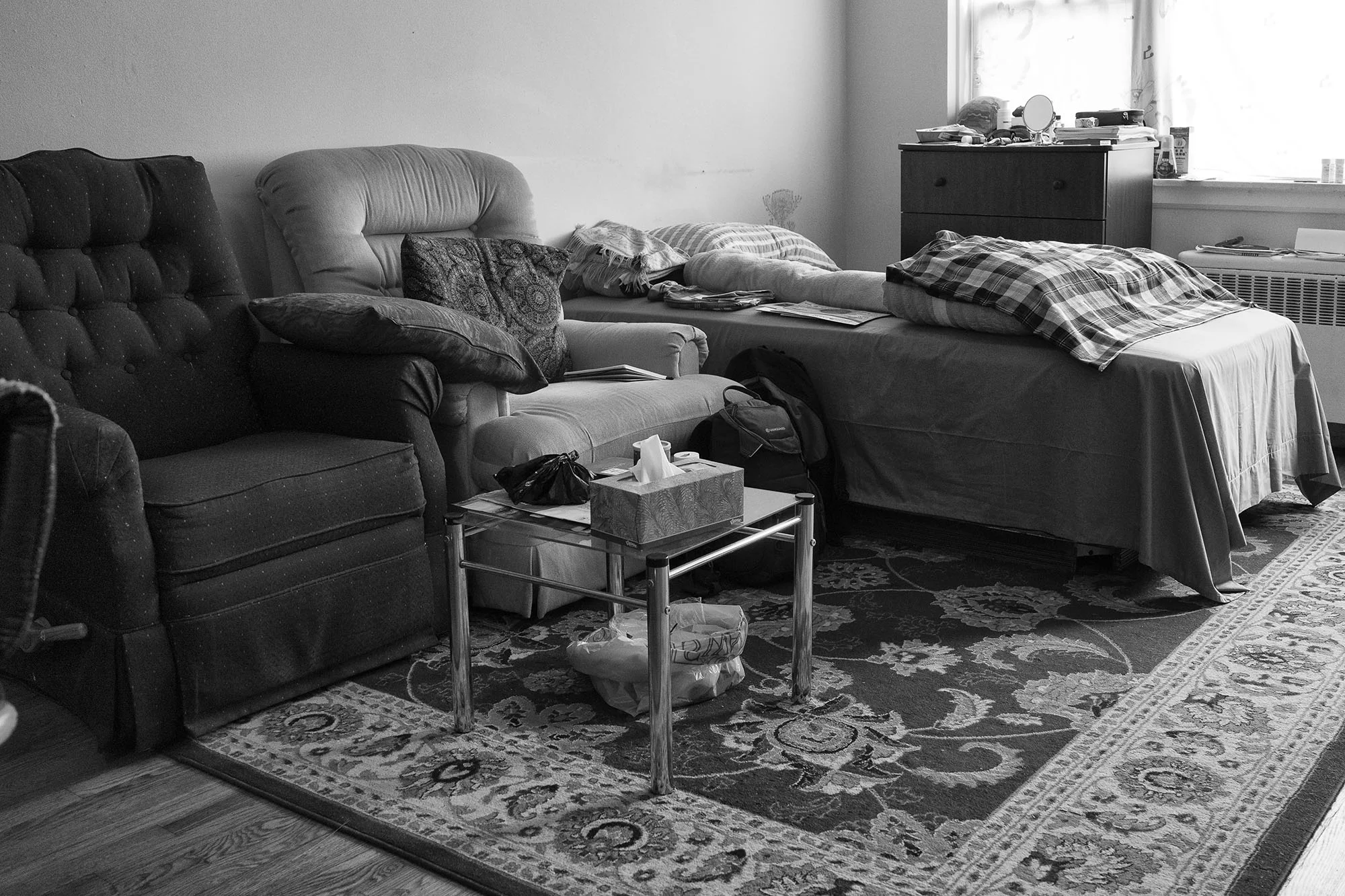 Mohammed lives off Devon Street, a popular Muslim neighborhood in Chicago, with his nephew and nephew's friend. This is the first home in over 30 years where he hasn't feared deportation. Though he had asylum in Malaysia, it was't uncommon for refugees to be deported regardless. However, in Chicago, he isn't without worry. He rarely ventures beyond Devon Street and opts to pray at home in the evenings, his fear of violence on the bustling streets keeping him anchored where he is comfortable. 