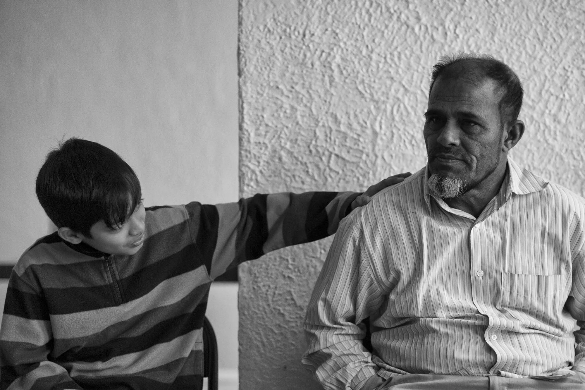 Abdul sits with his son, Yasseif, who is 12 years old. Yasseif was born in Malaysia and has never had a formal education. As a result, he is significantly behind. Abdul wants his son to maintain his identity. “I always remind my son, who we are, where we come from. We have to keep telling the history of Burma. I tell him every day: Don’t forget your grandmother, your relatives who are still there. I try my best.”