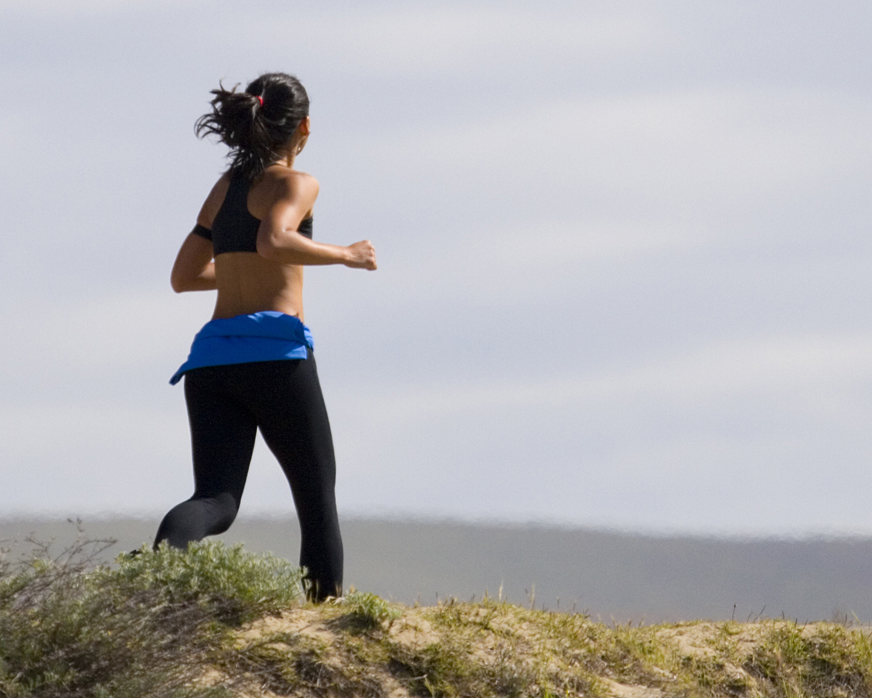The many health benefits of running can be enhanced by a regular yoga practice.