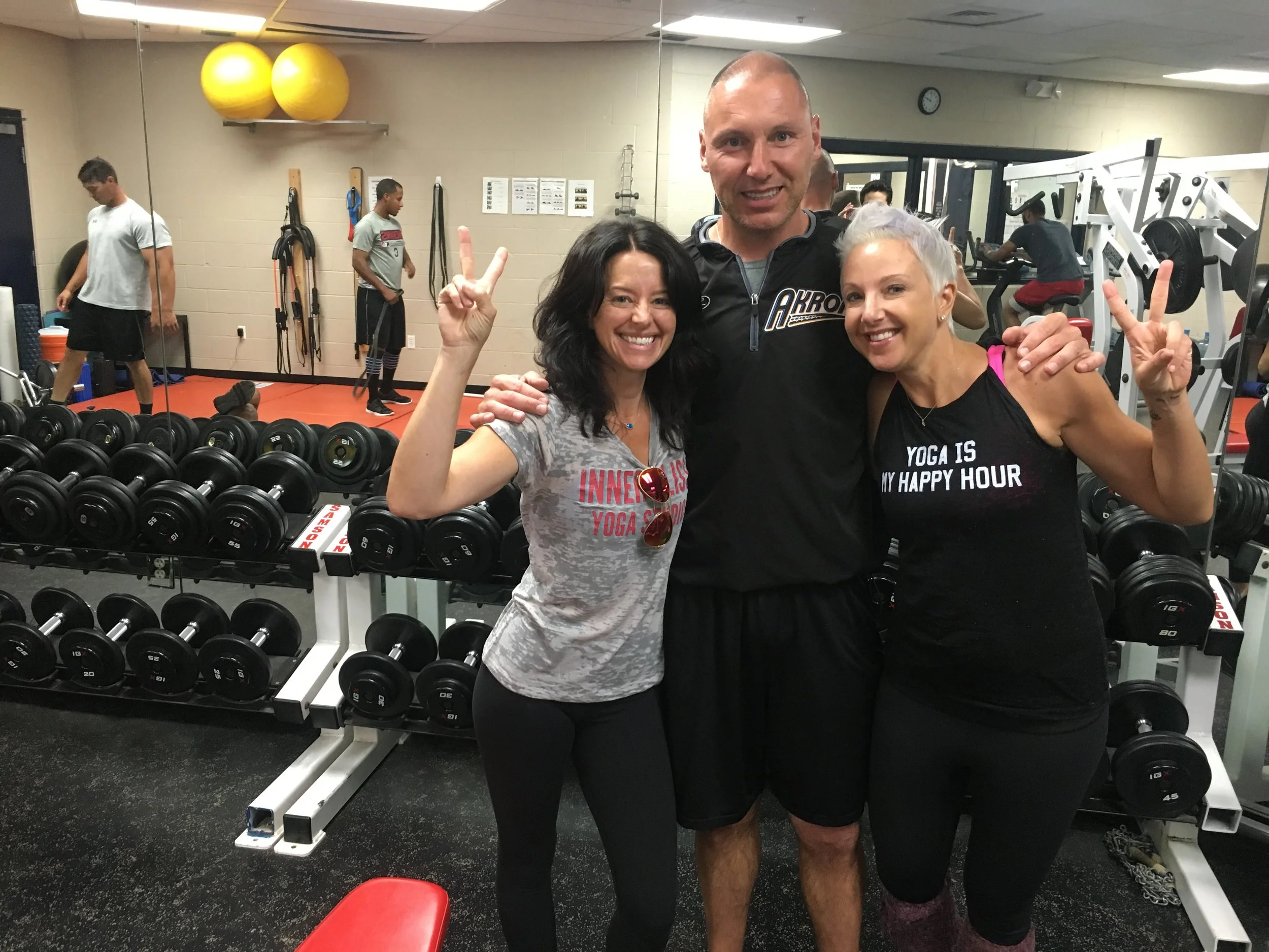 IBY teacher Katie Brown, Paul Synenkyj (Strength and Conditioning Coach for the Akron RubberDucks), and IBY teacher Kim Rush at the RubberDucks' training facility.