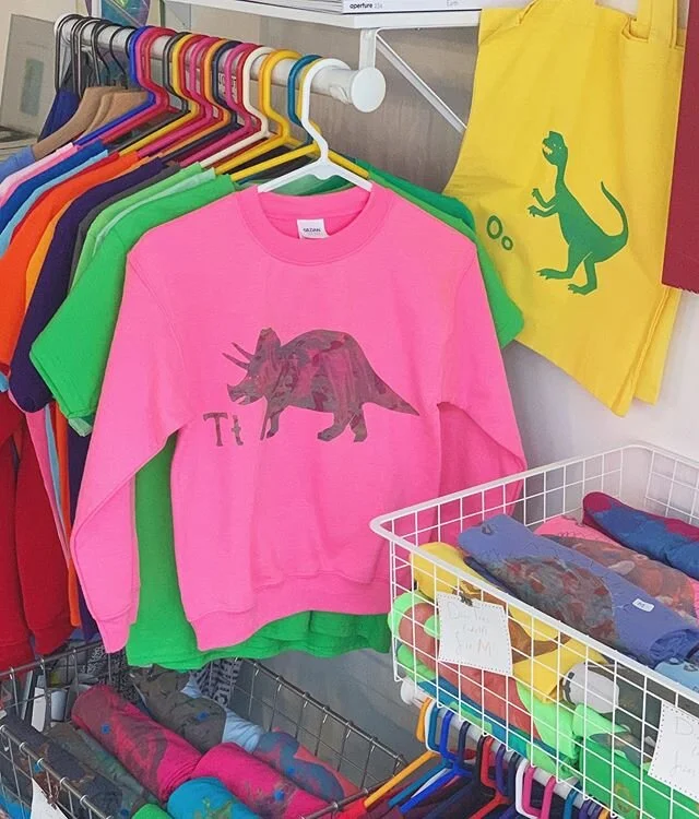 This is our dino zone : Dino tees, sweatshirts, &amp; totes have been restocked! #handprinted by #risdalumni , Naushon Hale - Each one is #screenprinted by mixing paint to create a truly unique design!  #oneofakind #madeinprovidence #dinosaur .
.
.
.