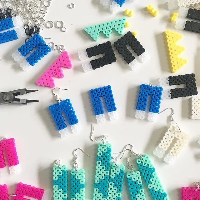 Remember Perler beads? Relive your childhood &amp; wear this cute earring #handmade by #risdalumni @makwa_studio .
.
.
.
.
. 
#shophandmade #givehandmade #shoplocalri #buylocalri #shopsmallbusiness #shoppvd #wickendenstreet #providencerhodeisland #ri