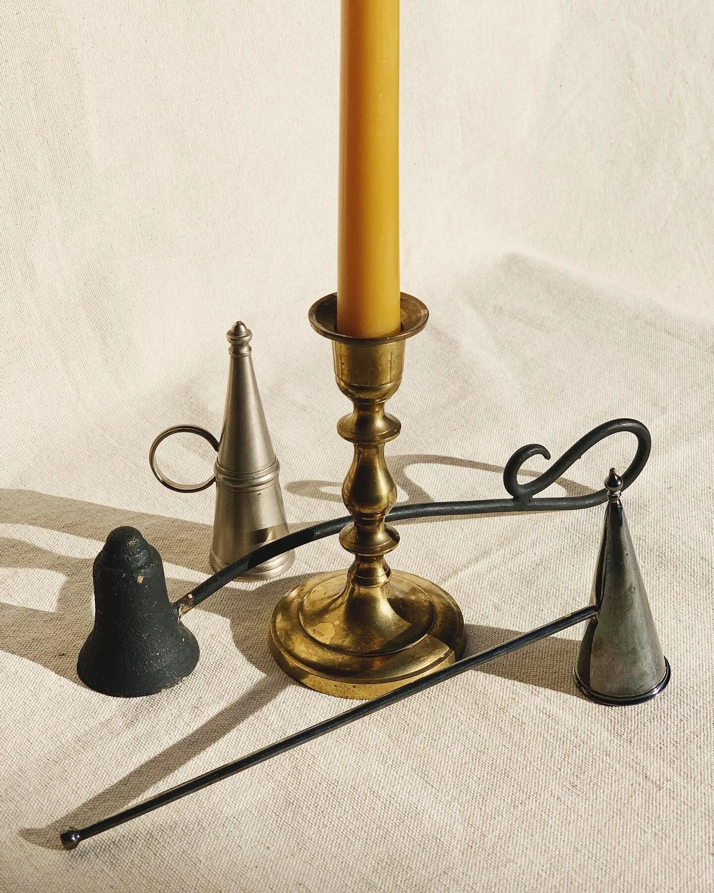 Very into candle snuffers these days. 
We&rsquo;ve sourced some pretty cool ones too! 

Swipe for our current offerings of  vintage snuffs &amp; brass candle holders. 

New, springy colors of beeswax tapers arrived from @greentreehomecandle , too! 

