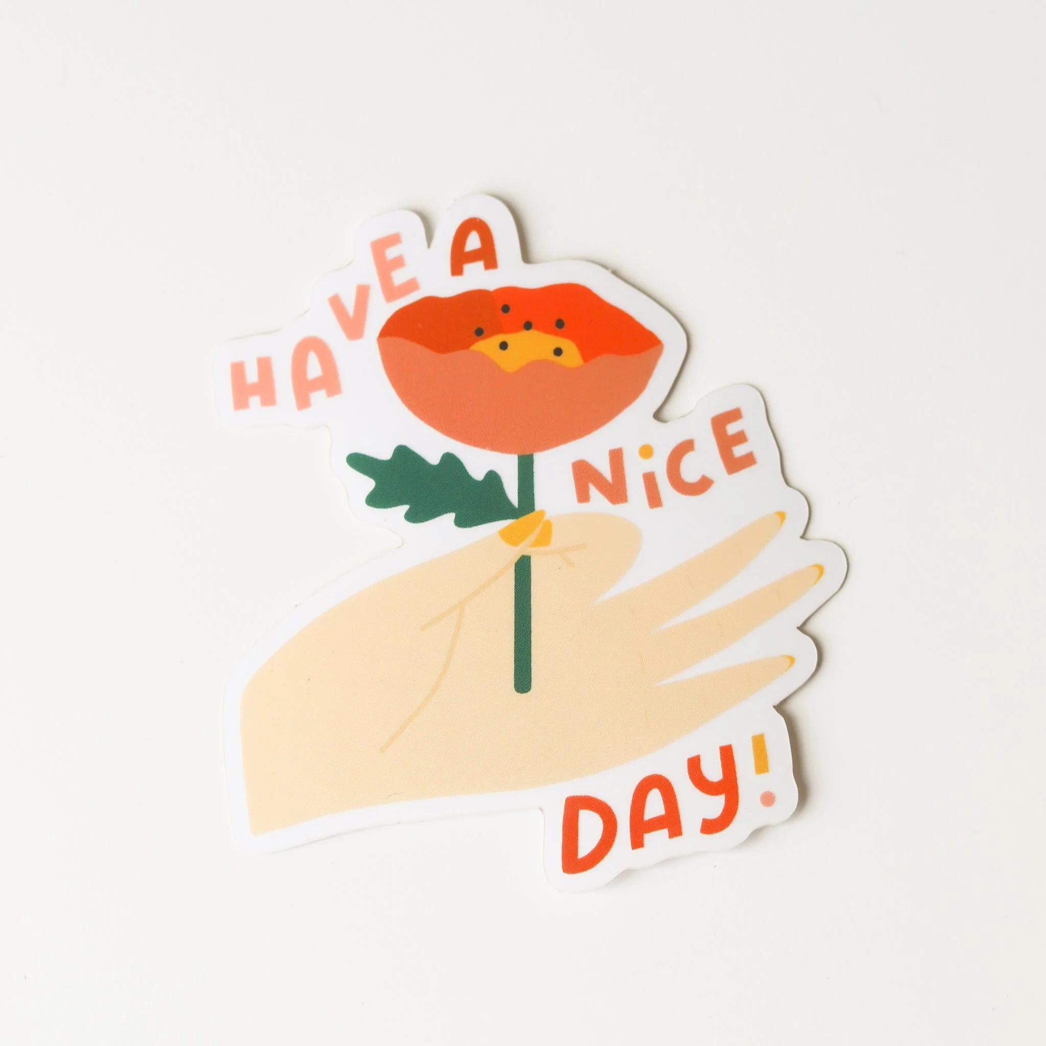 HAVE A NICE DAY HAND HOLDING FLOWER STICKER_1.jpg