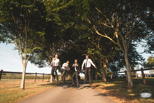 Jumping for joy, as the bride and her maids are ready. Just as if it were a real wedding.