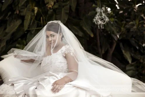 Beautiful Bride in Veil and Dress by Helena Couture Designs