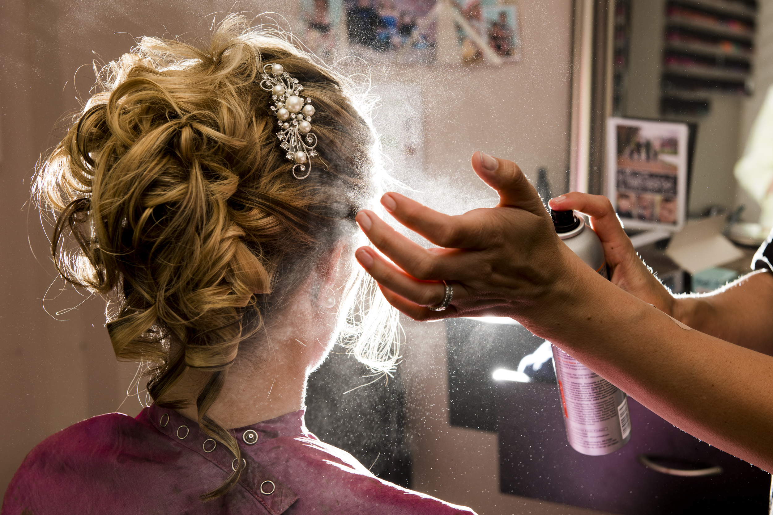 bride getting hair done