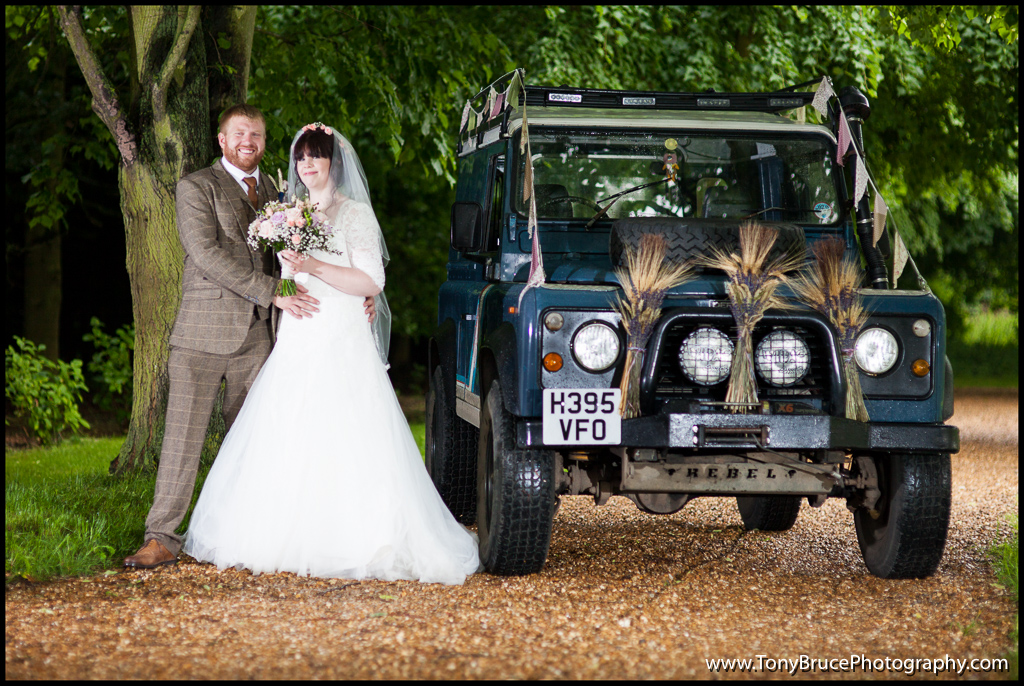Dany and Laura next to his beloved Defender. My first attempt at day time off camera flash really helped to even out the exposure. Check out the decor on the car!