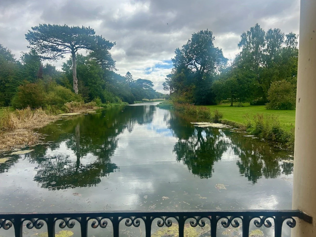 LOOKING DOWN THE LAKE FROM THE PALLADIAN BRIDGE