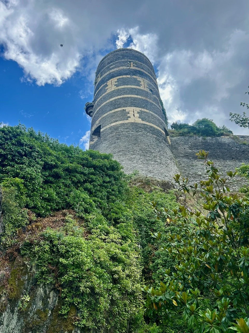 Looking up to one of the castle's turrets high above us