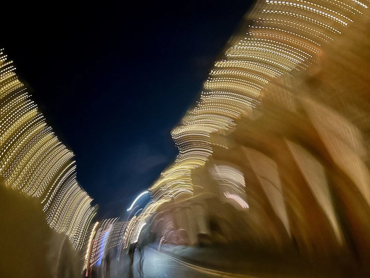 The christmas lights but in a wierd pocket style taken picture - lots of dots in a strange bat shape formation