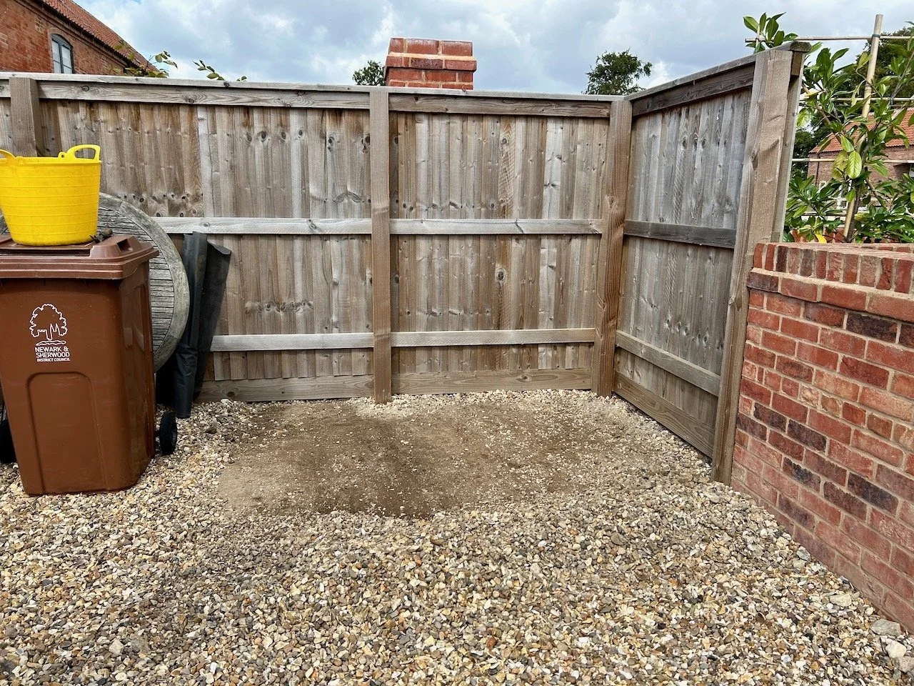 A cleared corner area almost ready for the log store's permanent home