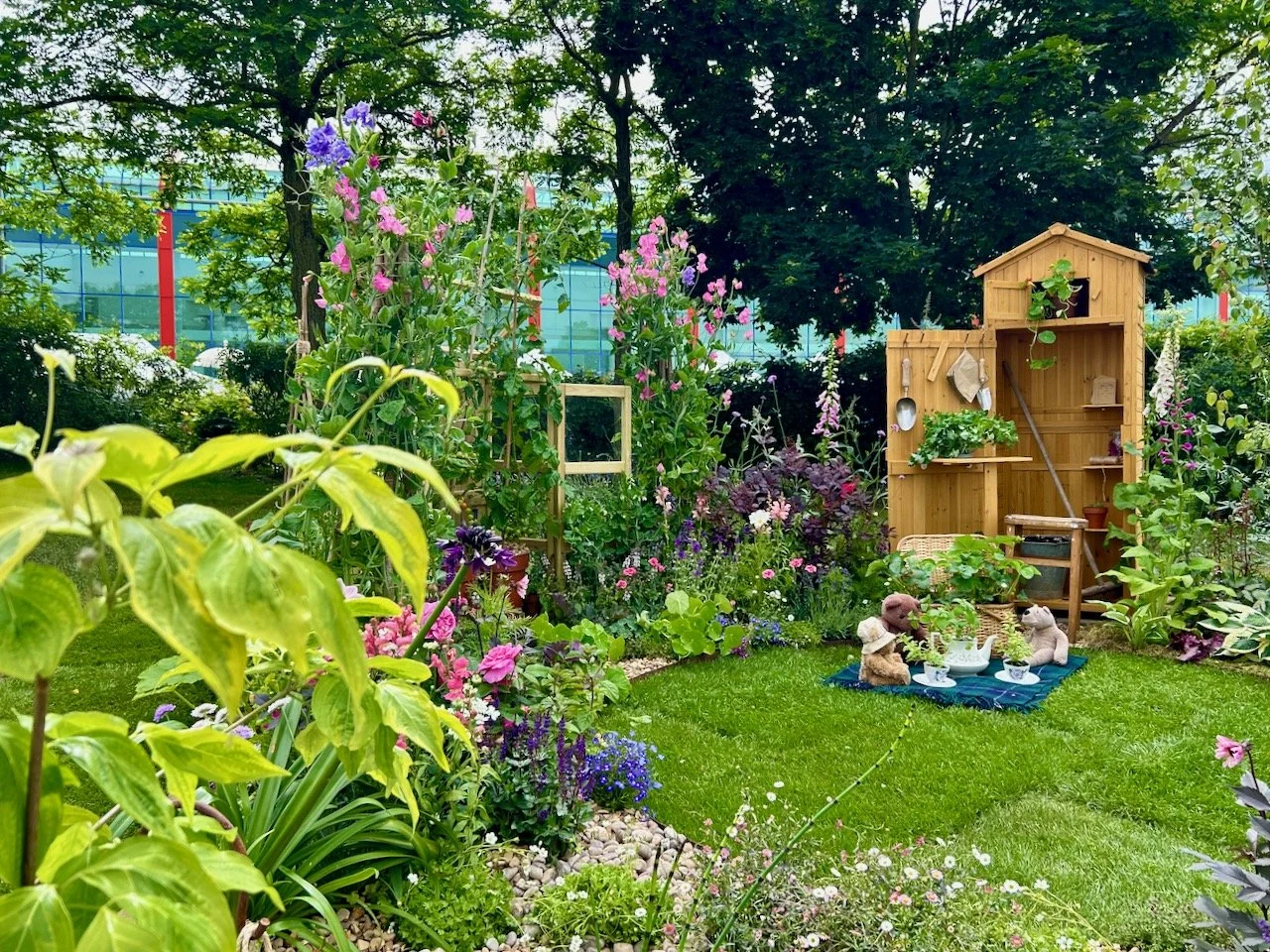 Looking into the centre of the showcase garden and the teddy bear's picnic on the grass