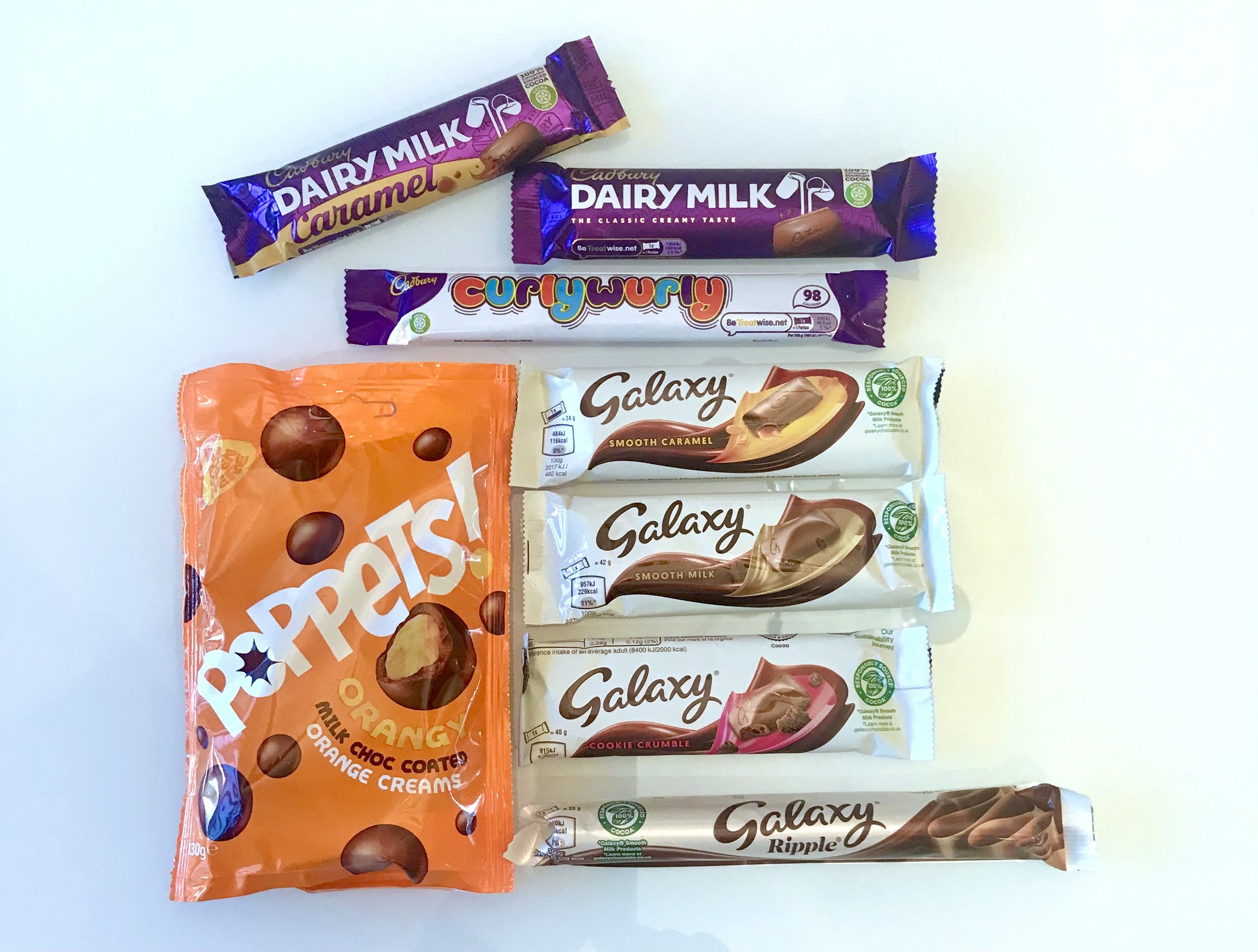 The sweet hamper also includes chocolate - galaxy bars, dairy milk, poppers and my long time favourite a curly wurly
