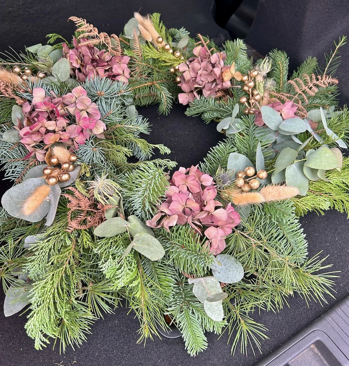 The next morning opening the car boot and seeing the wreath for the first time in daylight