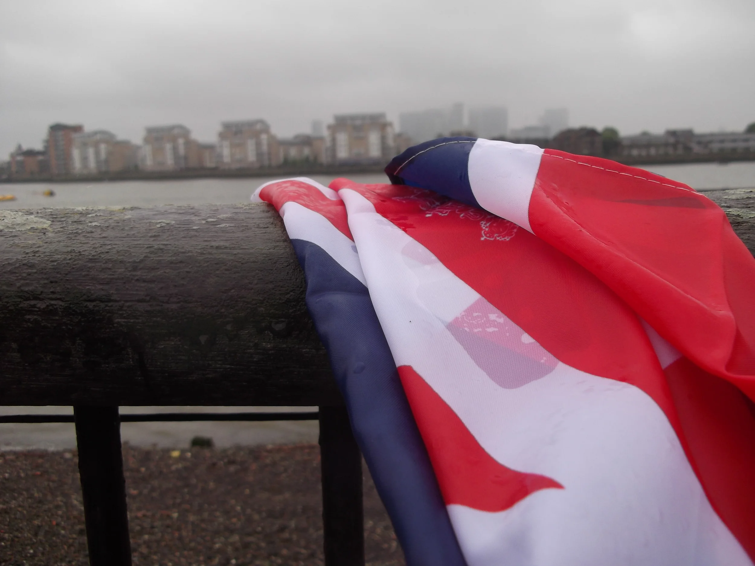 Waving a damp flag on a grey day at the Queen's Diamond Jubilee, Greenwich, June 2012