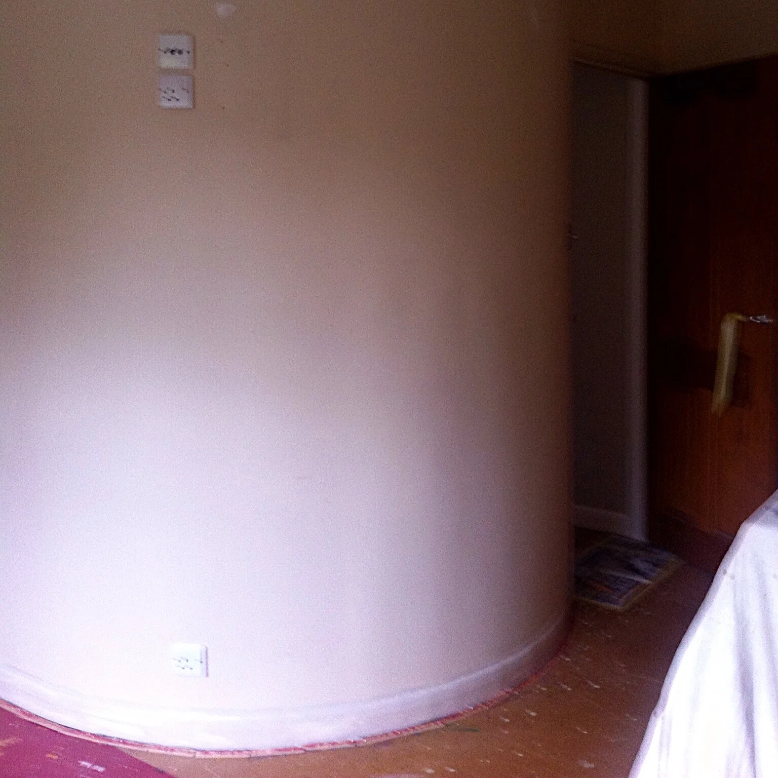 The curved wall curves around our spiral staircase and makes for an unusual shaped room