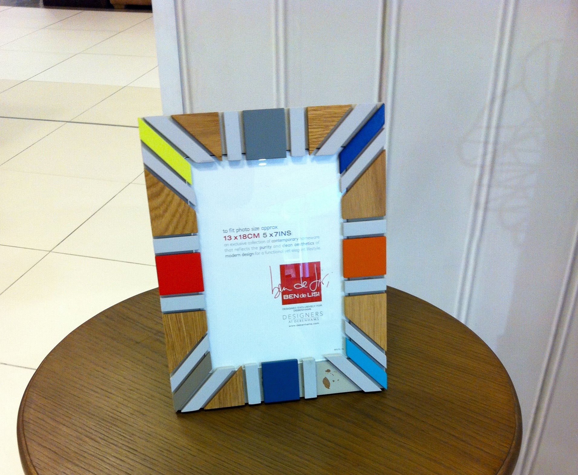 A COLOURFUL PICTURE FRAME IN DEBENHAMS