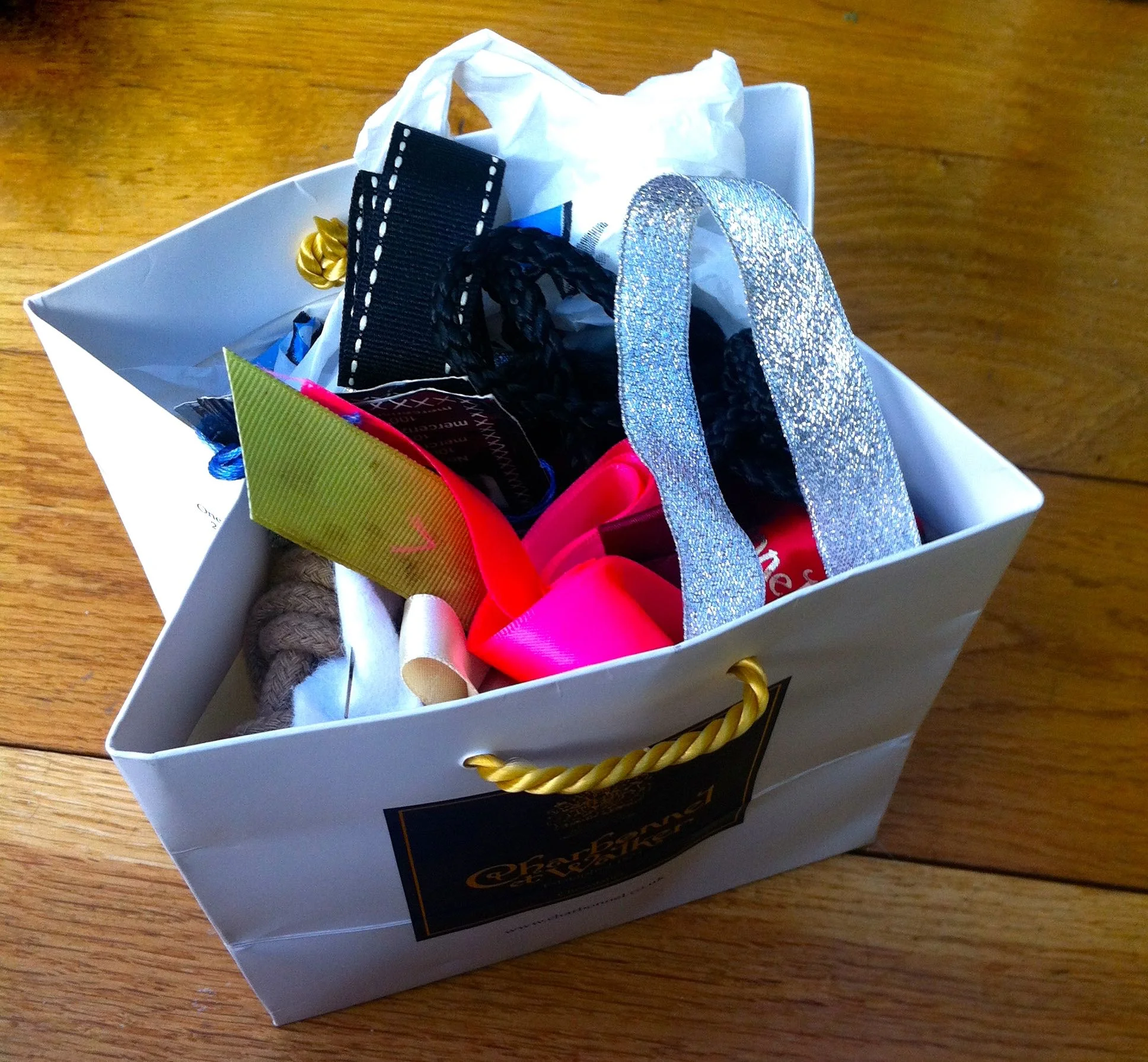 A BAG OF RIBBONS AND CORD