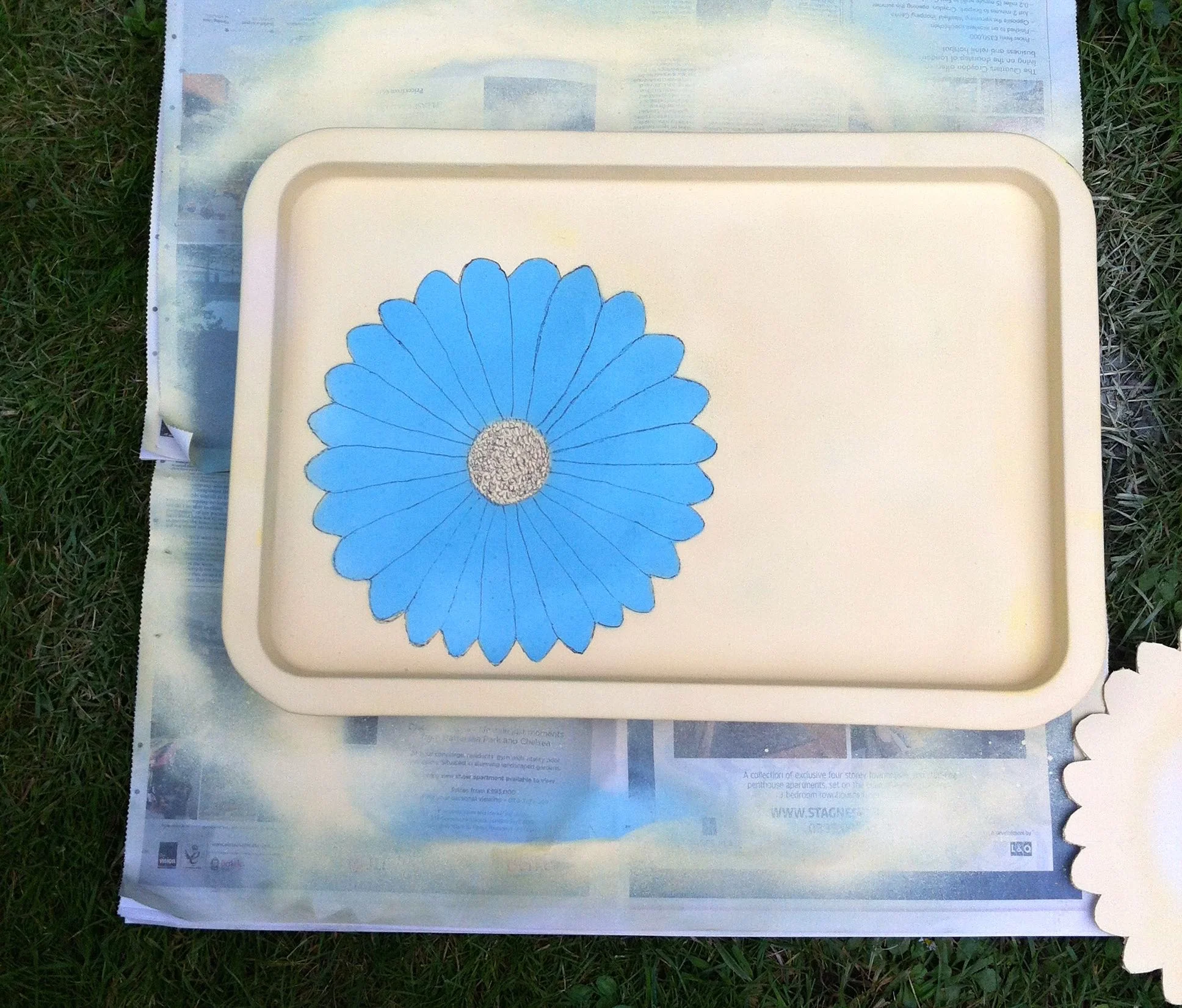 Adding depth and definition to my blue daisy with a black pen