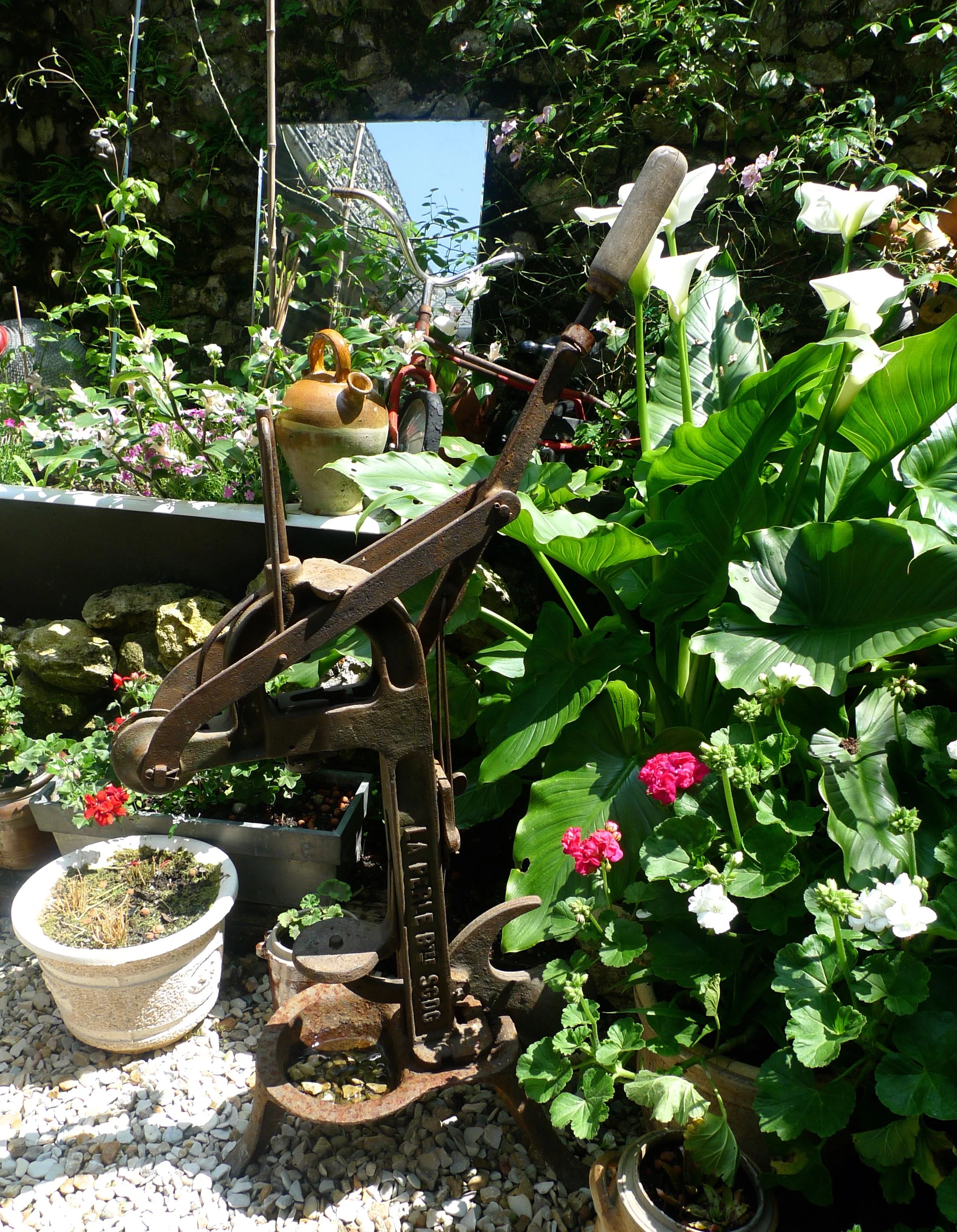 MY EYES DON'T KNOW WHERE TO LOOK FIRST, BUT NOTE THE CHILD'S BIKE IN FRONT OF THE MIRROR