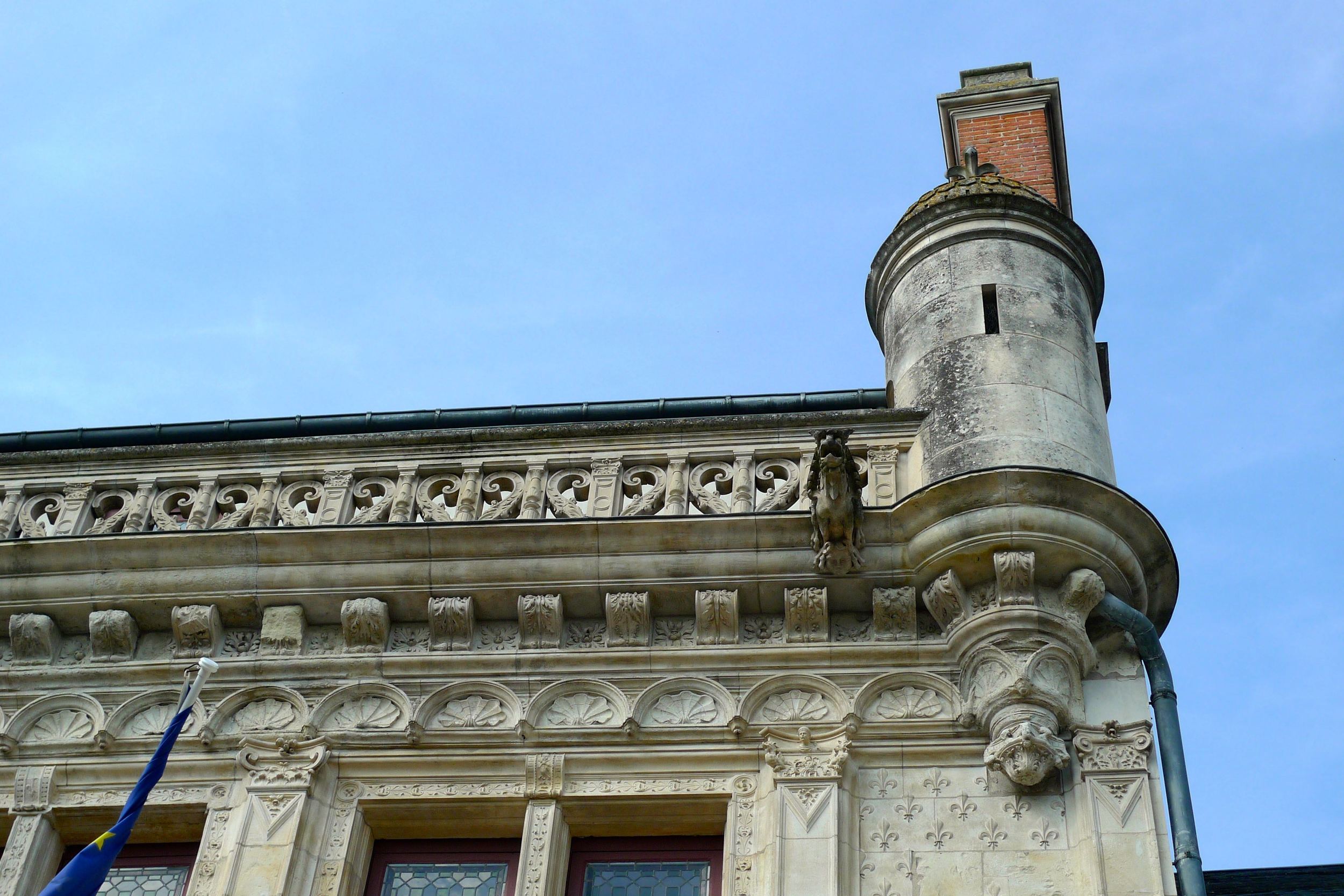 Looking up at the Hotel de ville and blue skies