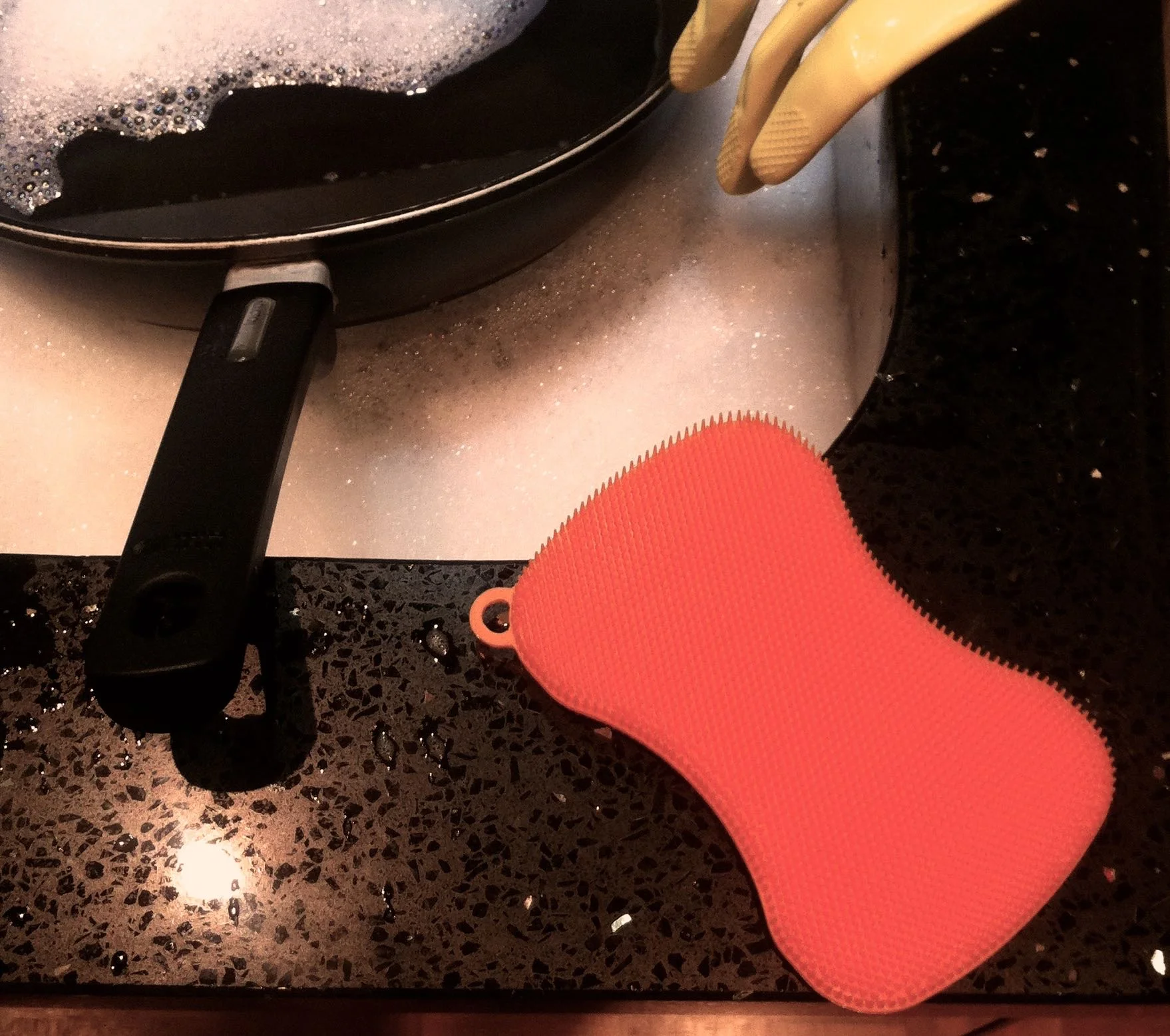 Using the orange scrubber on my frying pan