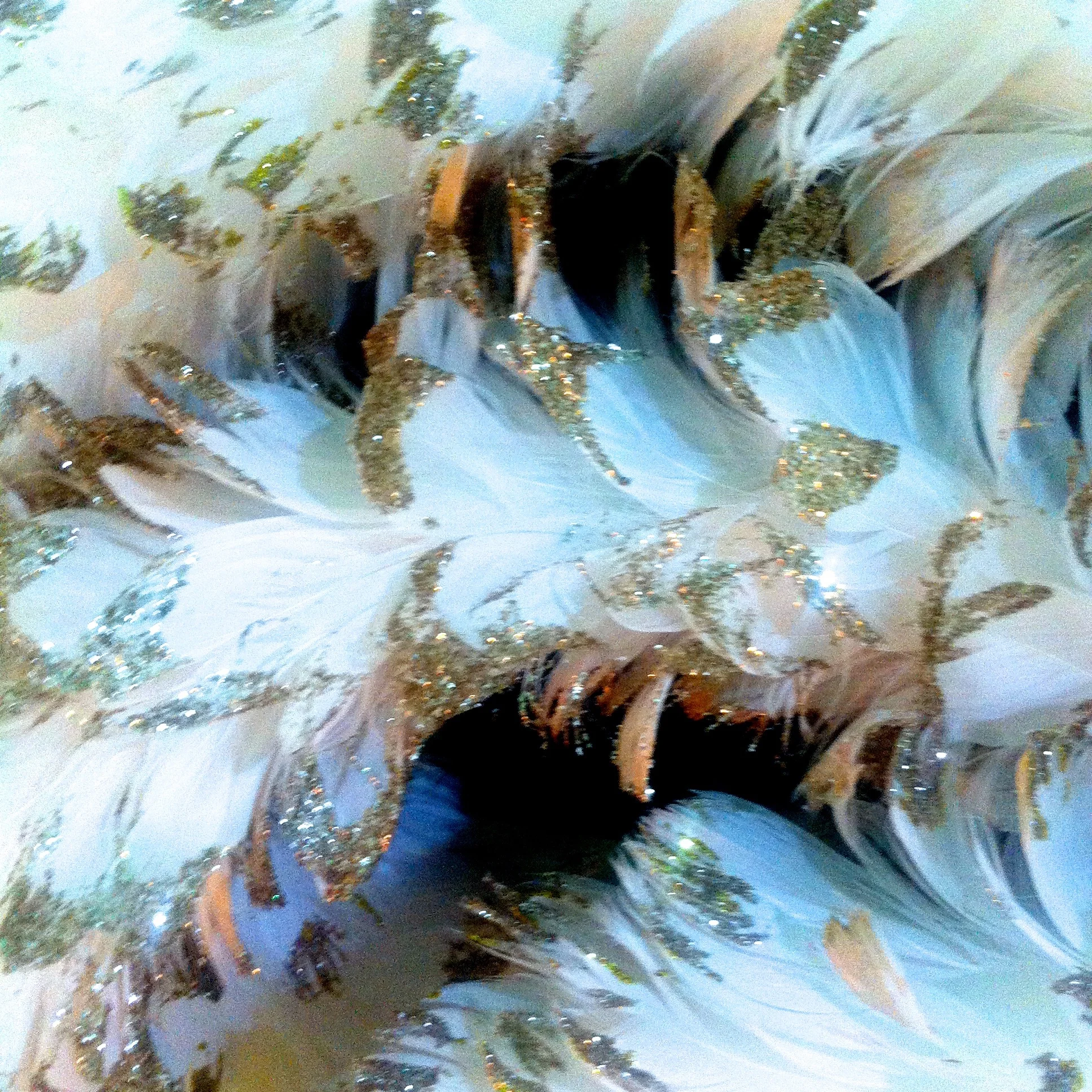 A close up of the feather wreath