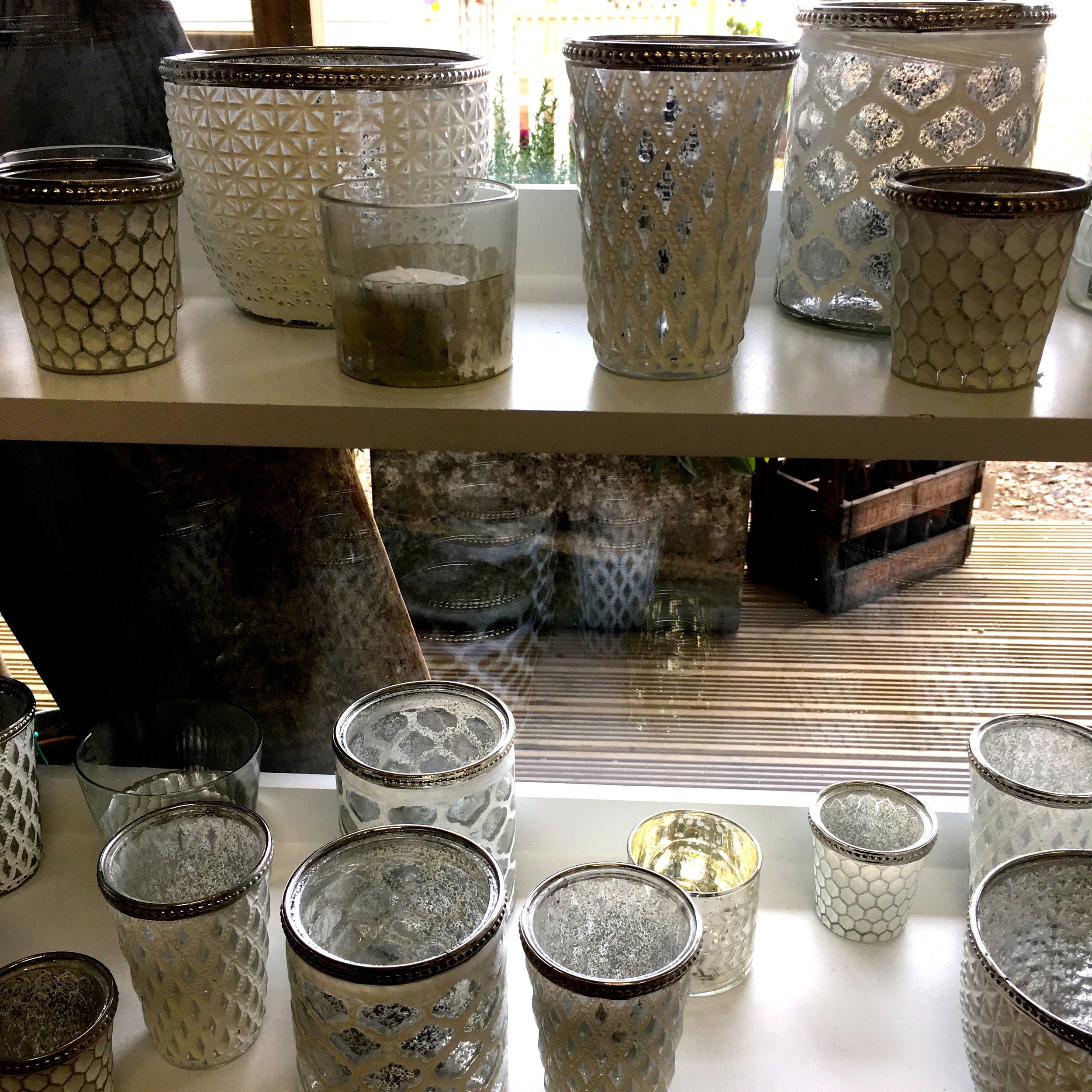 Shelves of glass vases