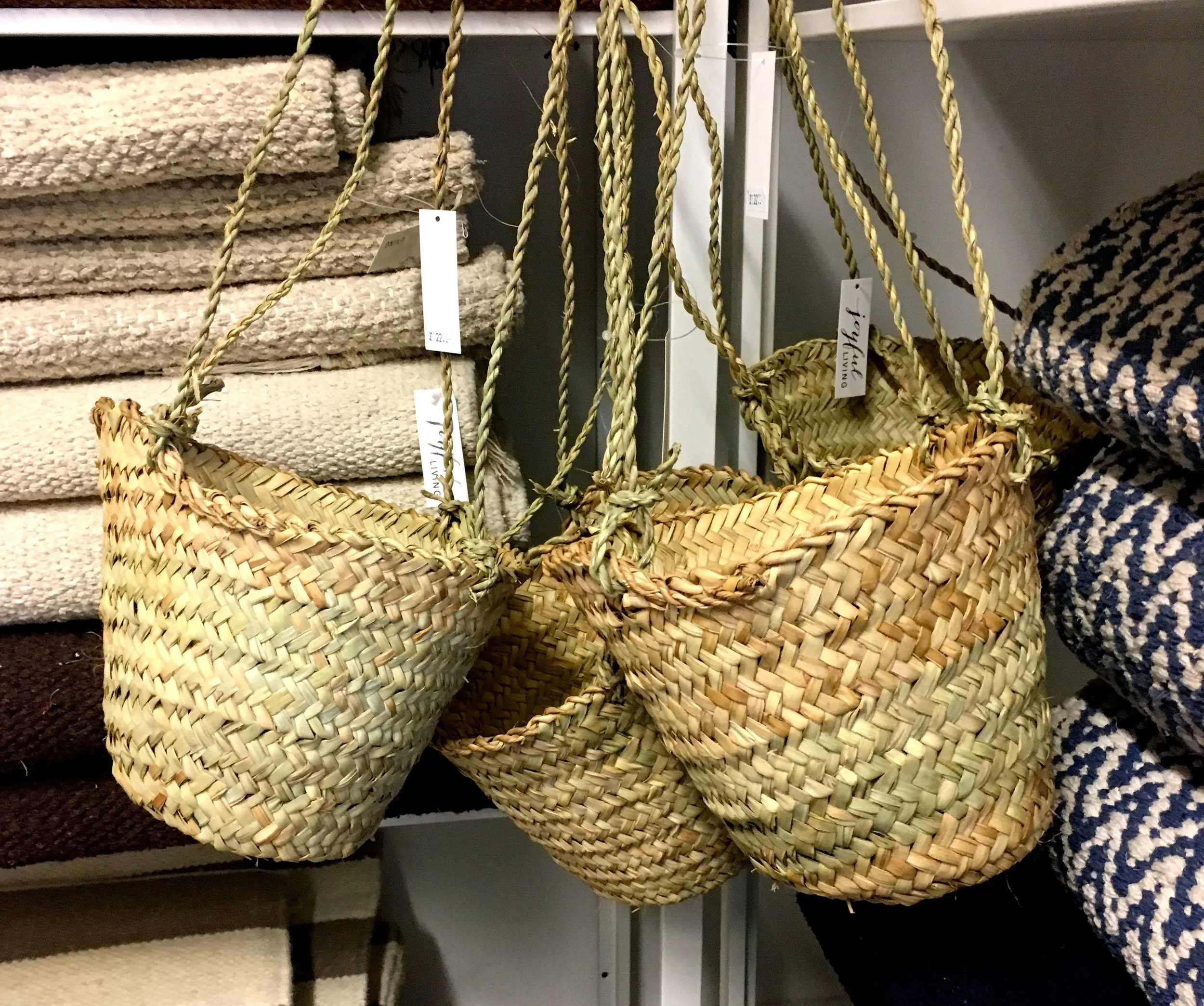 Natural materials hanging baskets and textural rugs