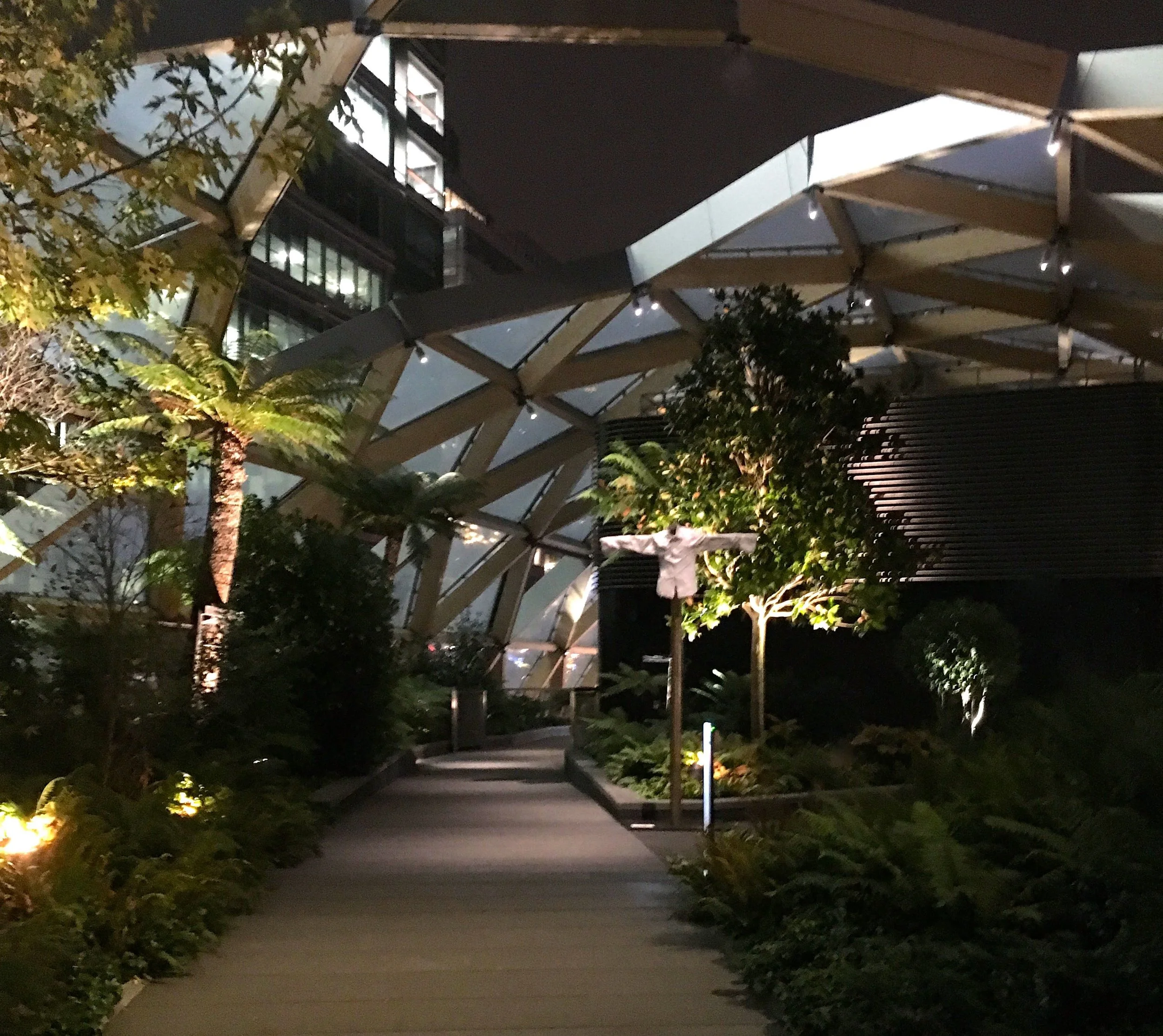 Admiring the roof garden in crossrail place in Canary Wharf at night