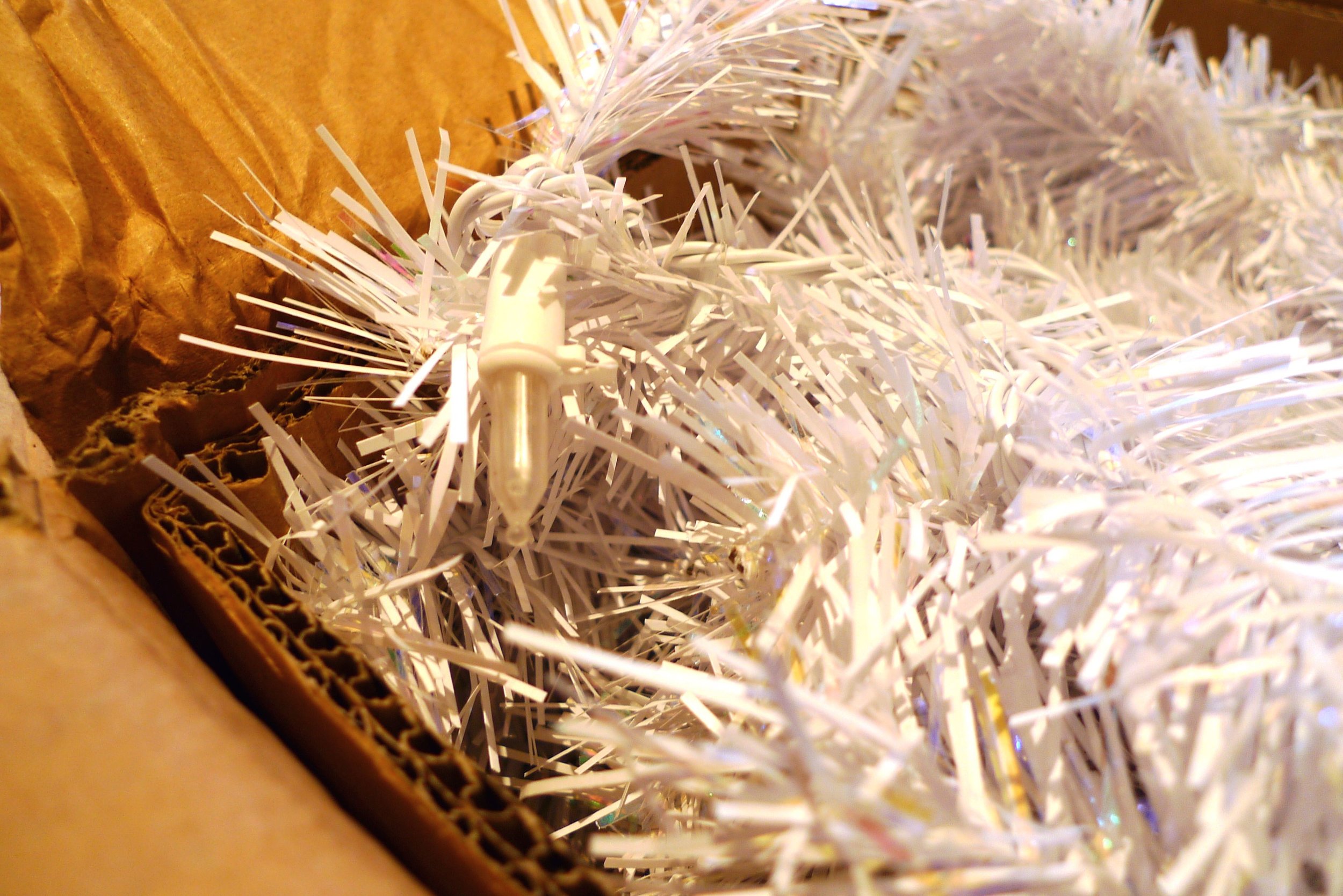 Opening the box from Treetopia with a white LED christmas tree