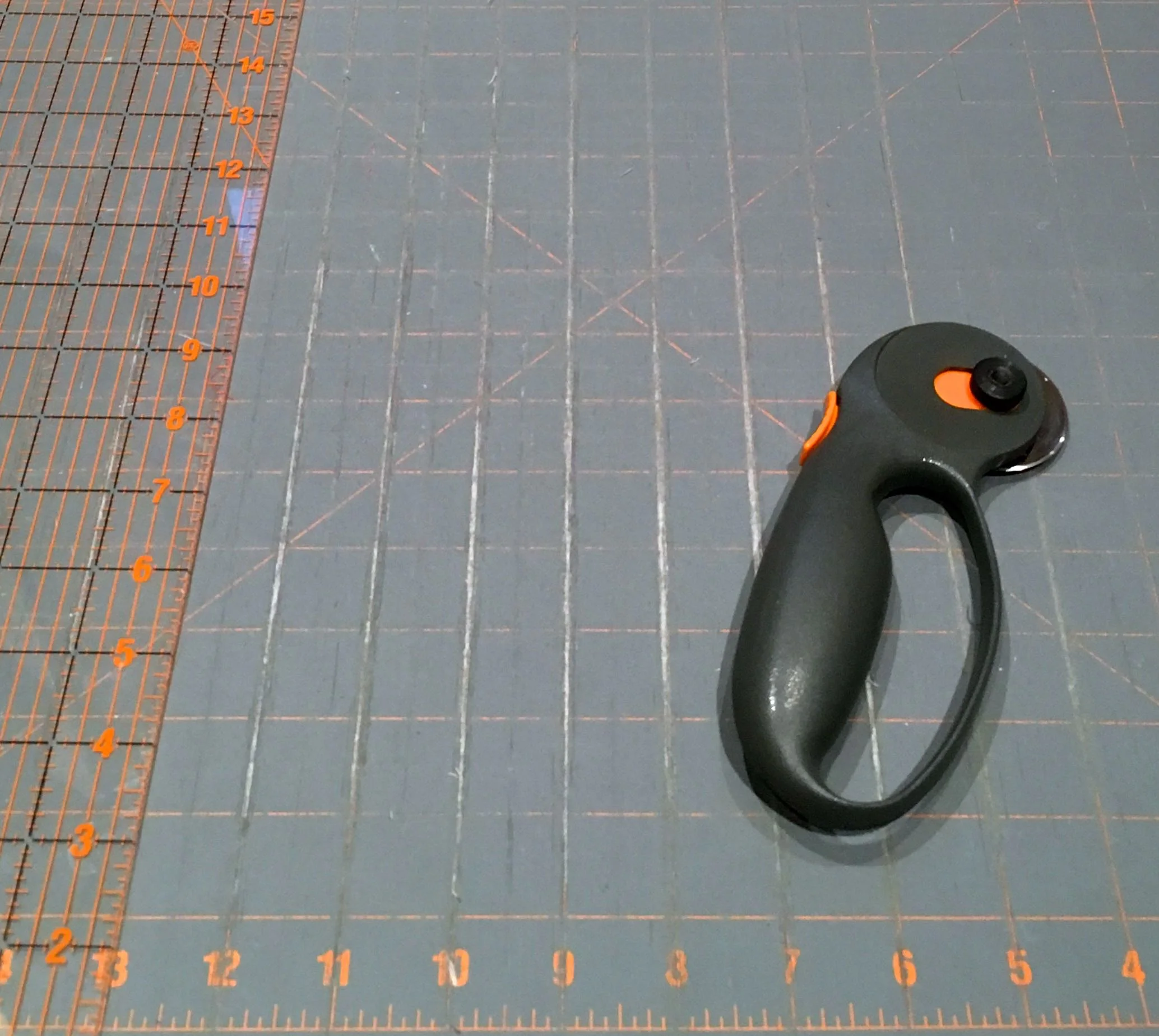My well-used rotary cutter and cutting mat has been getting even more use this weekend