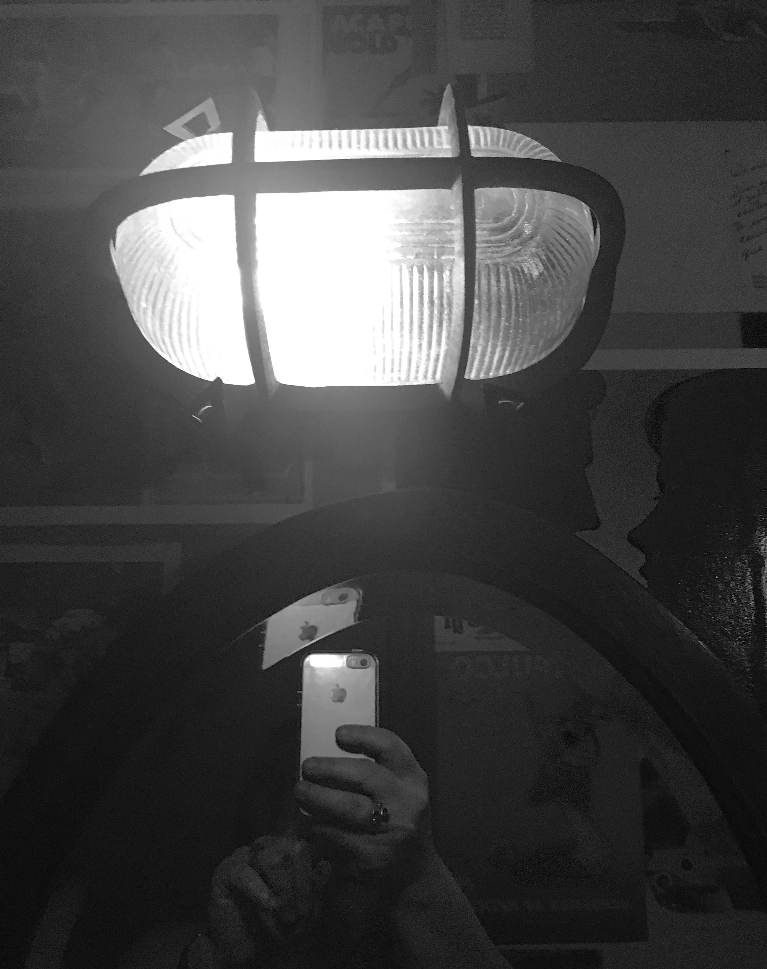 The same style light is above the mirror too