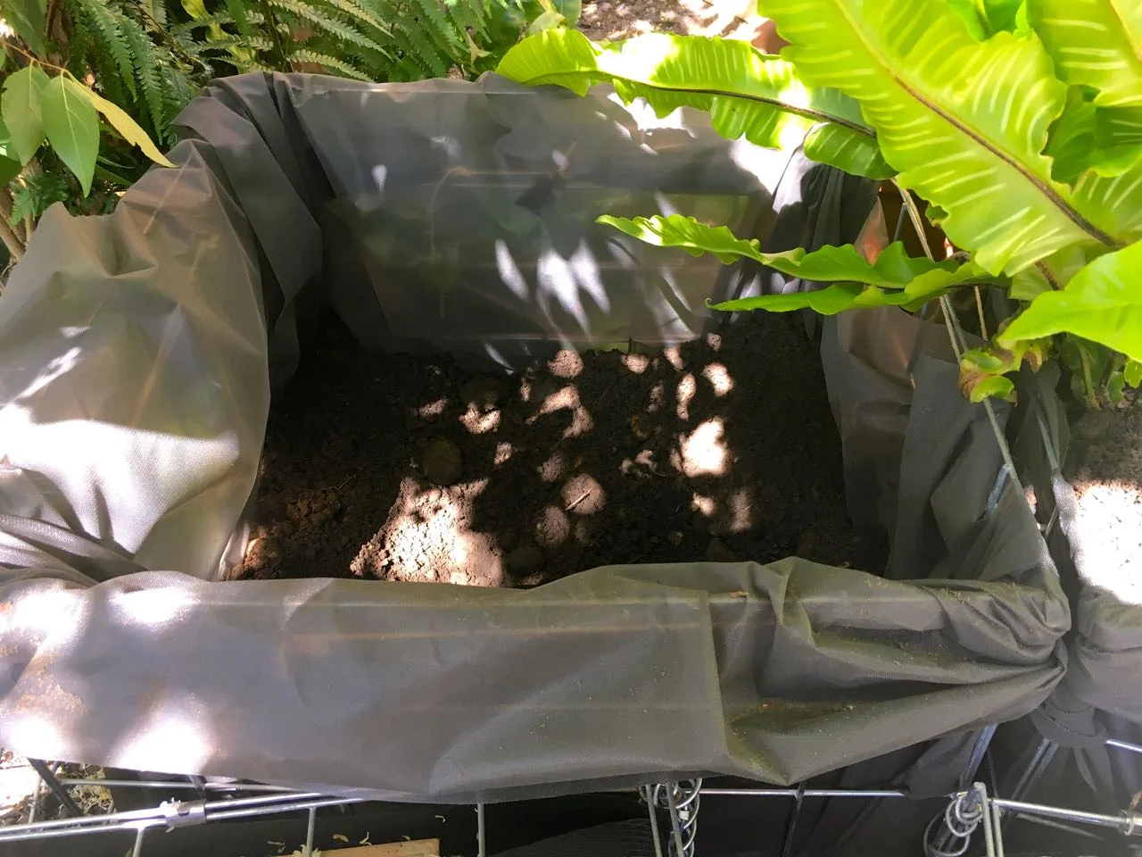 add membrane to gabion baskets to use them as planters