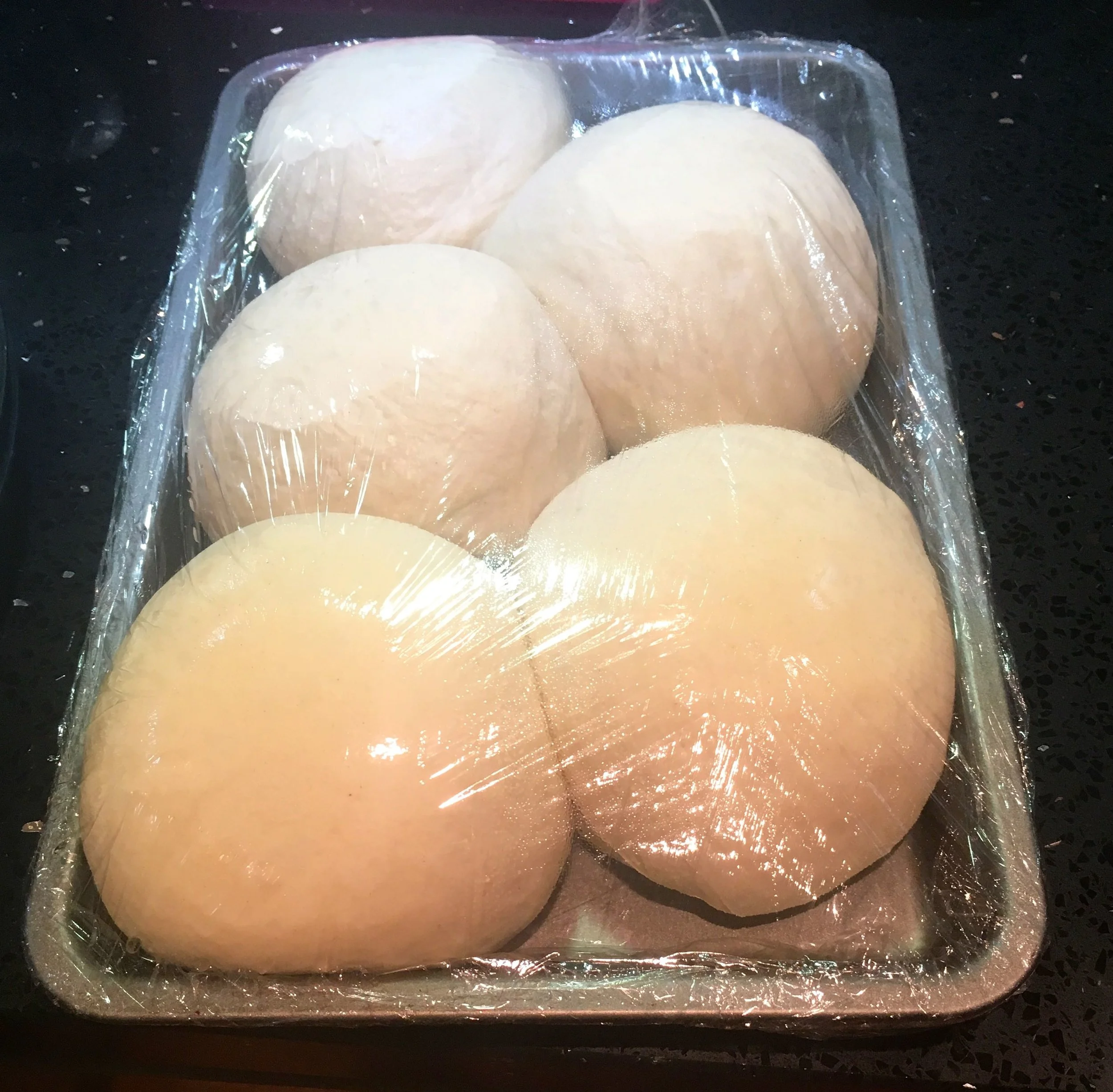 pizza dough on its second prove and ready to shape