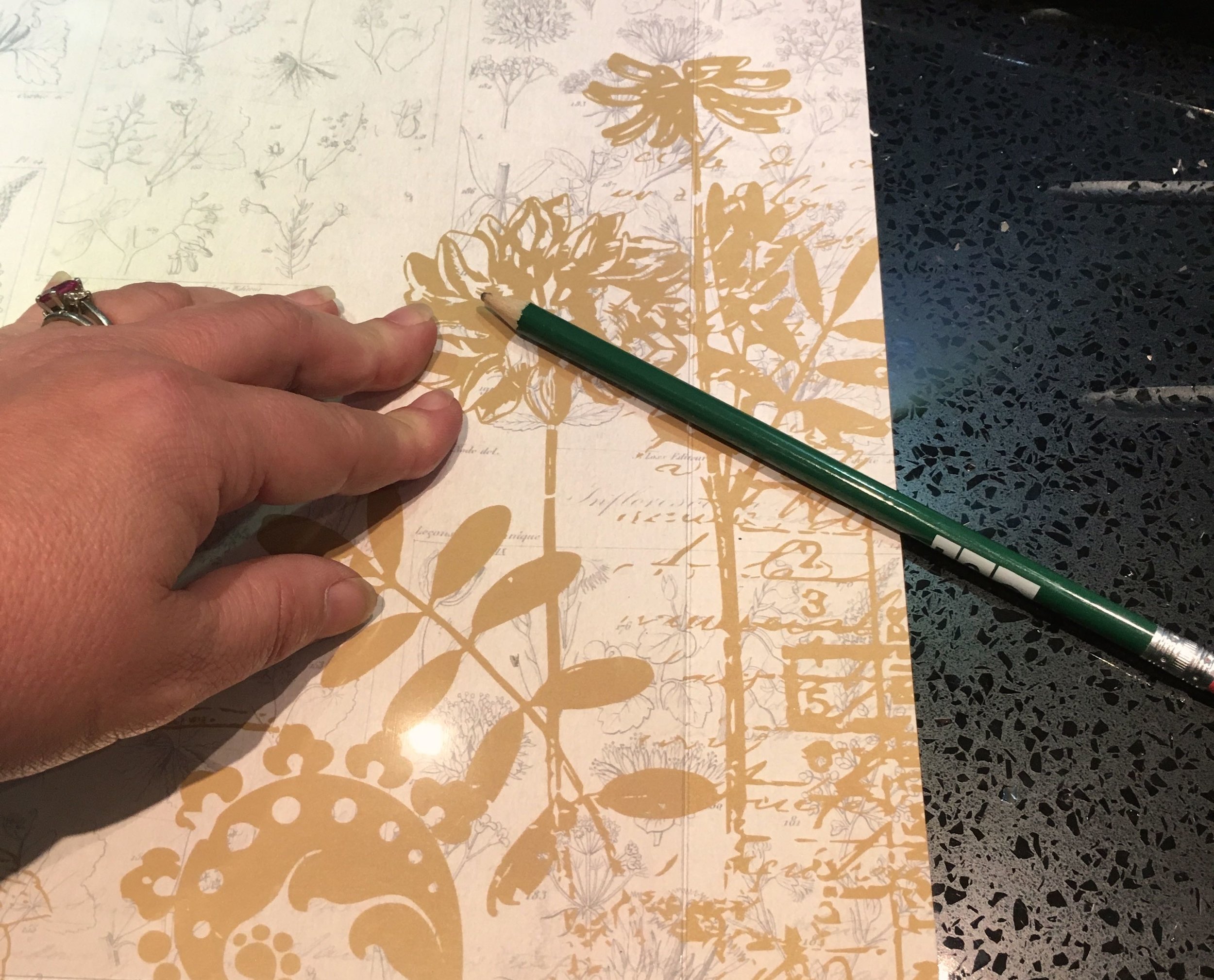 Marking out where to cut using the perspex from the frame