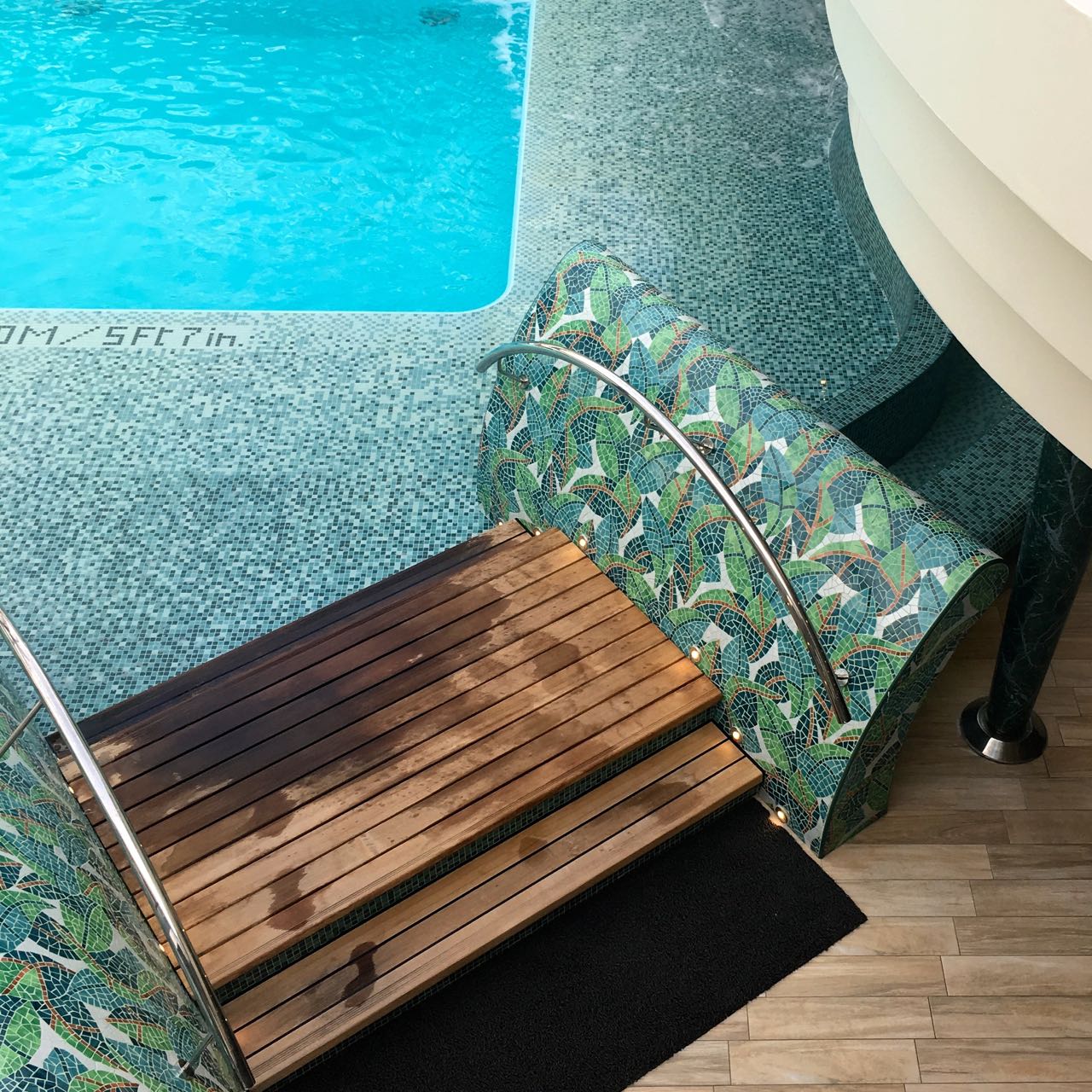 There's also the most exquisite tiling around the pool with the retractable roof MSC Preziosa