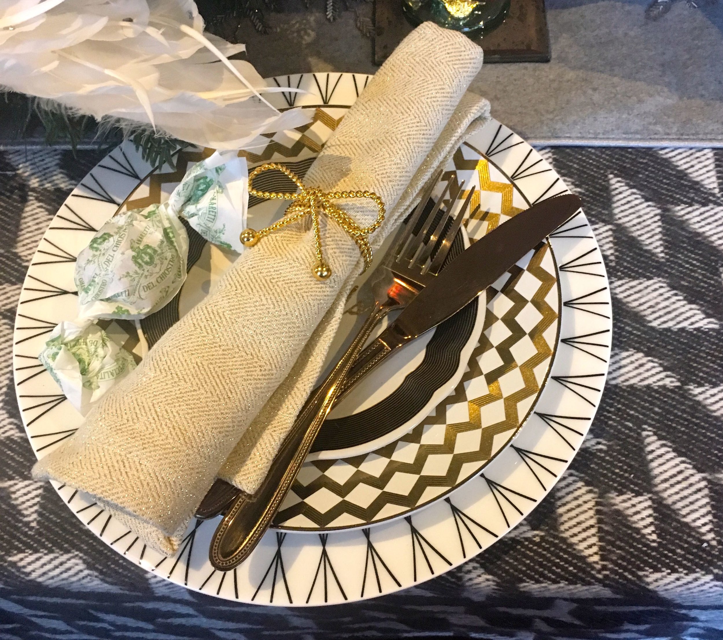 A gold place setting from HomeSense
