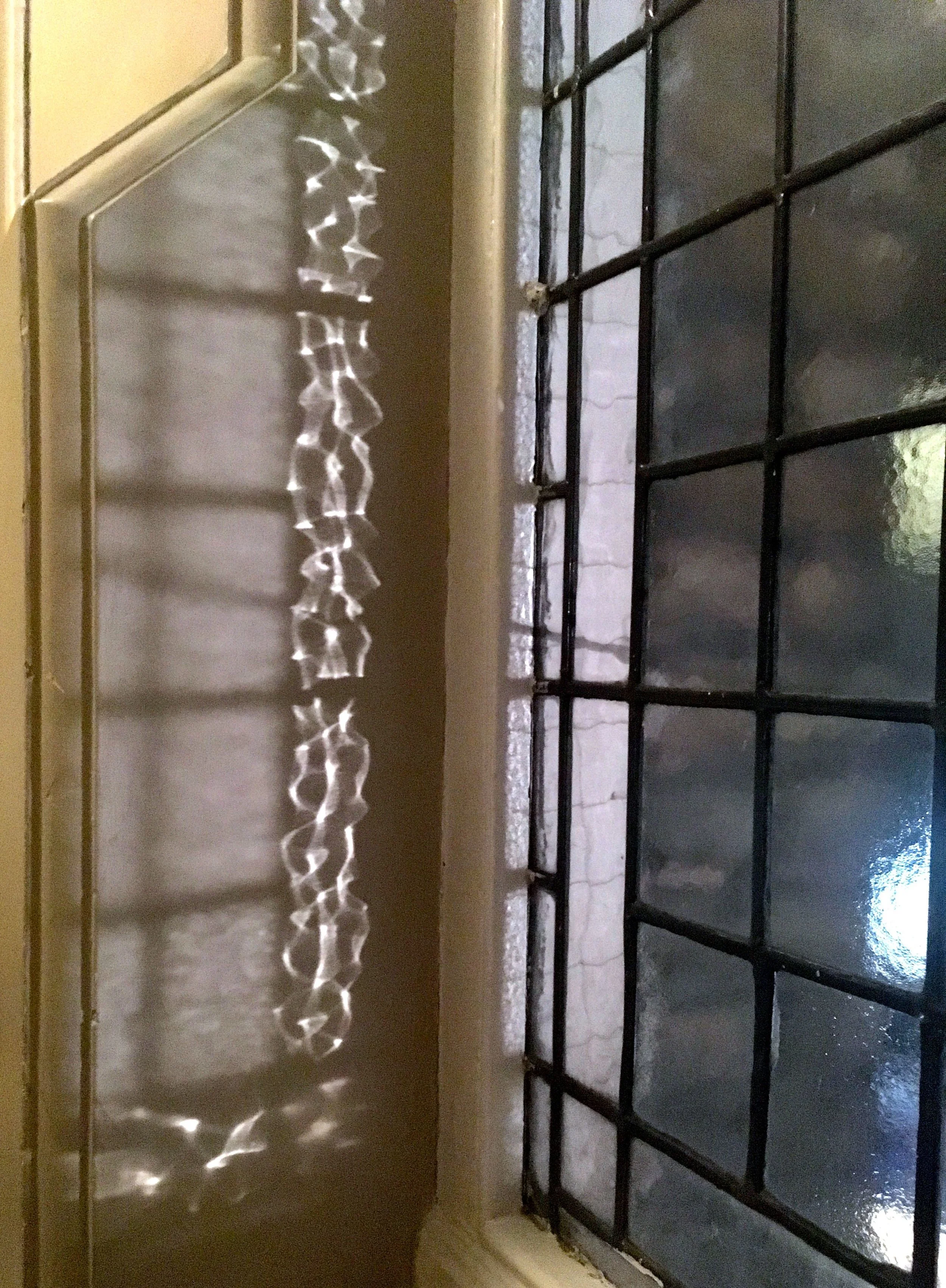 patterned light reflecting on the wall at St Ermin's hotel in London