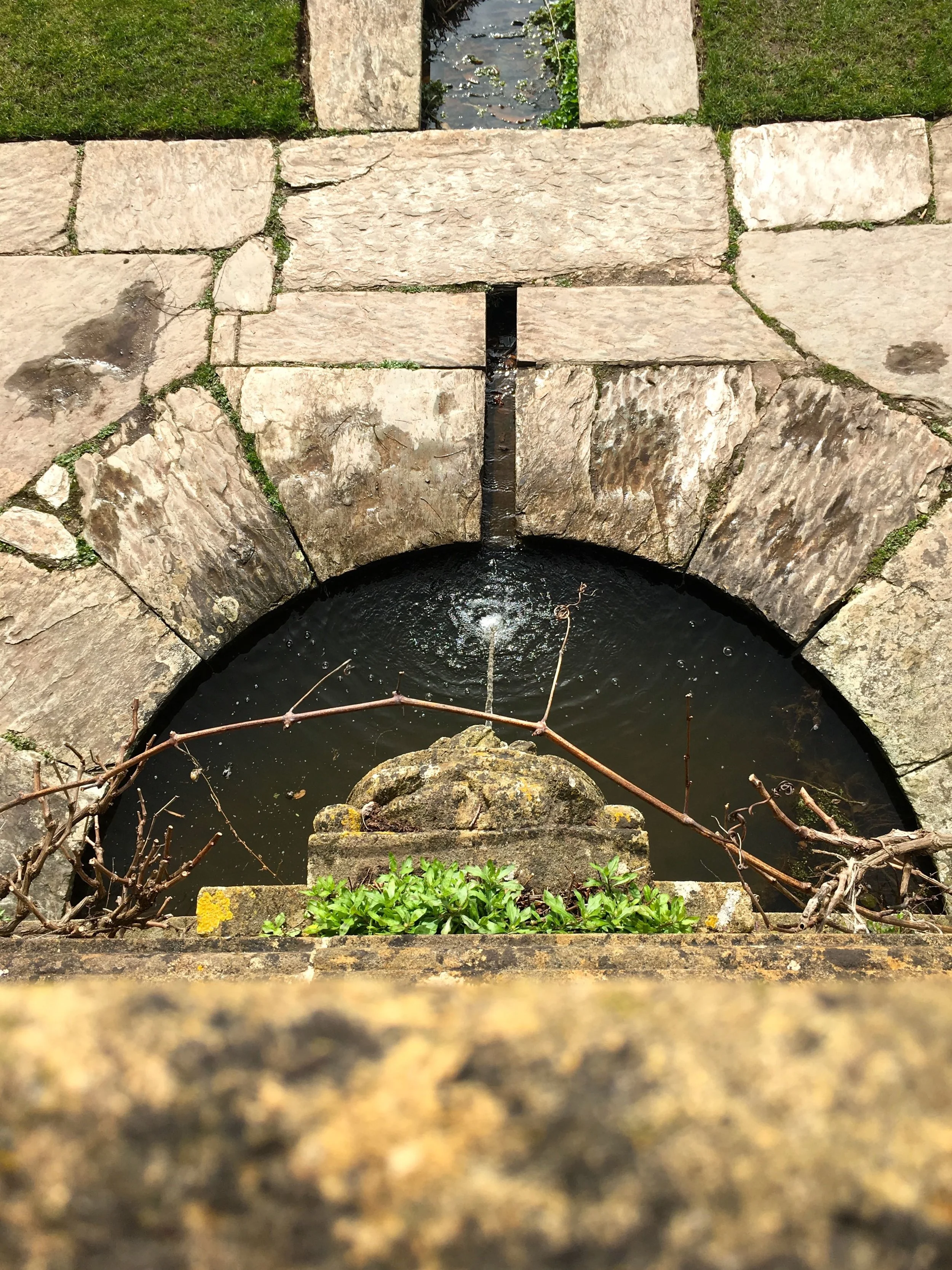 LOOKING DOWN AT THE FOUNTAIN FROM ABOVE