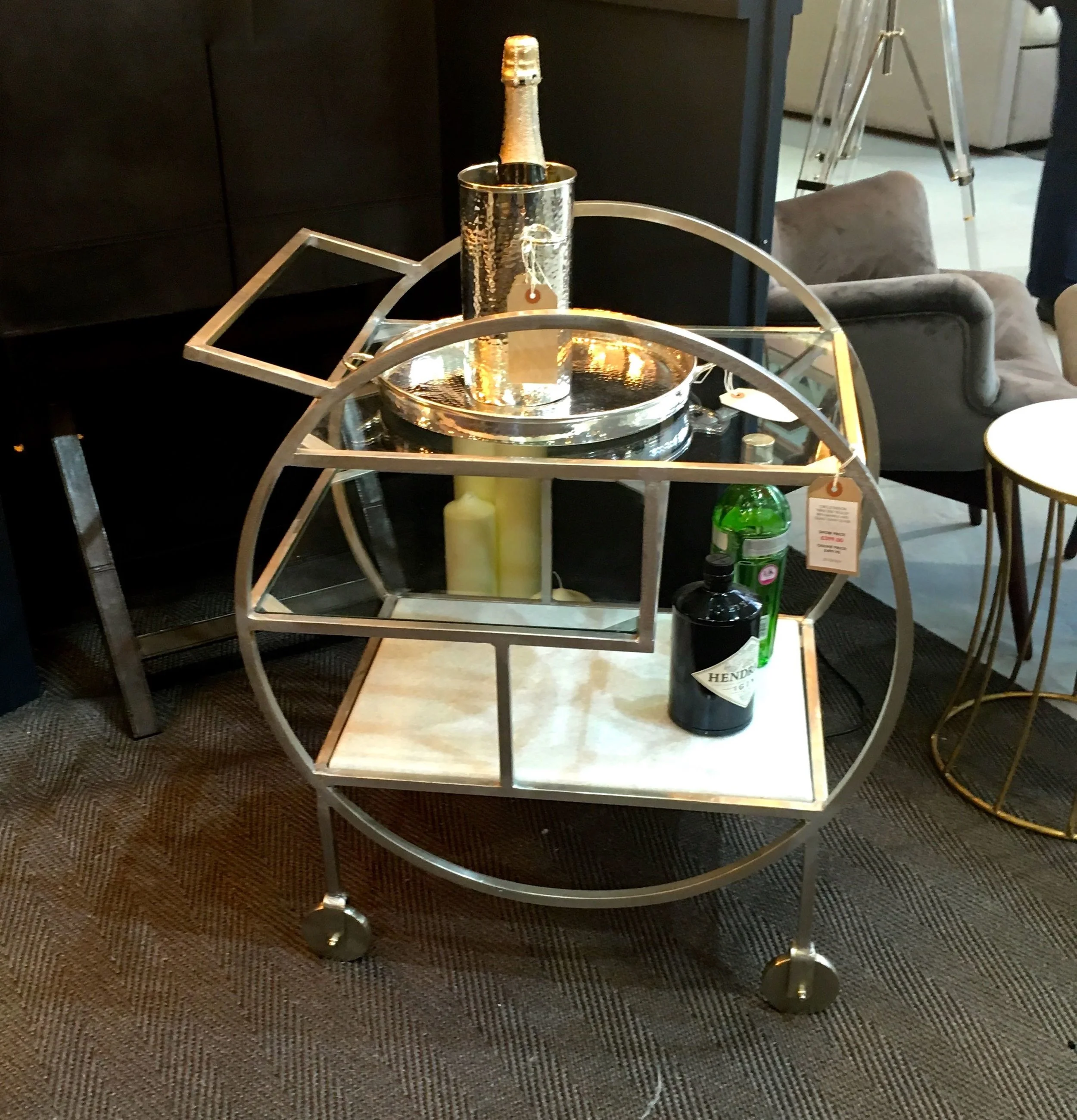 An art deco style drinks trolley
