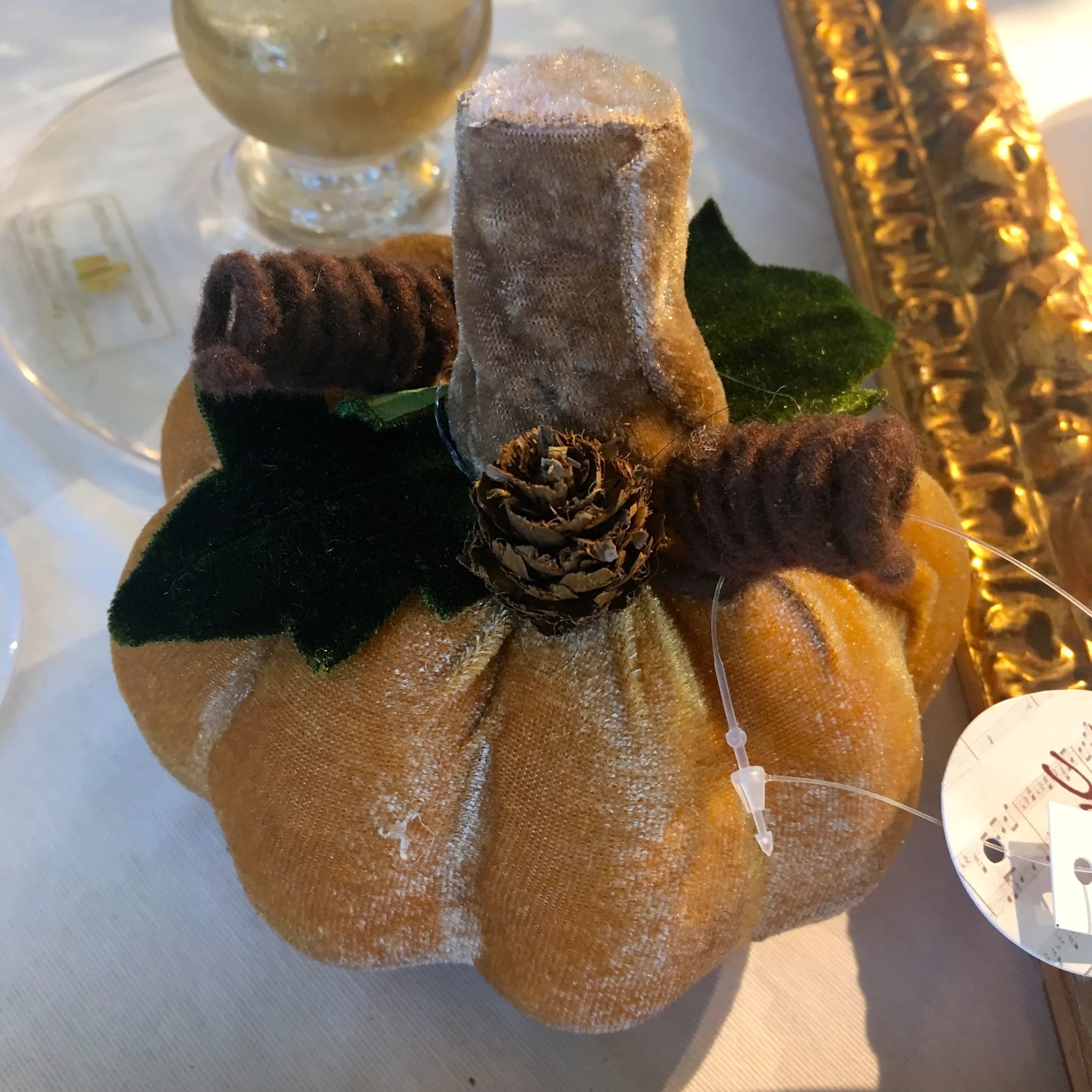 A smaller plush pumpkin