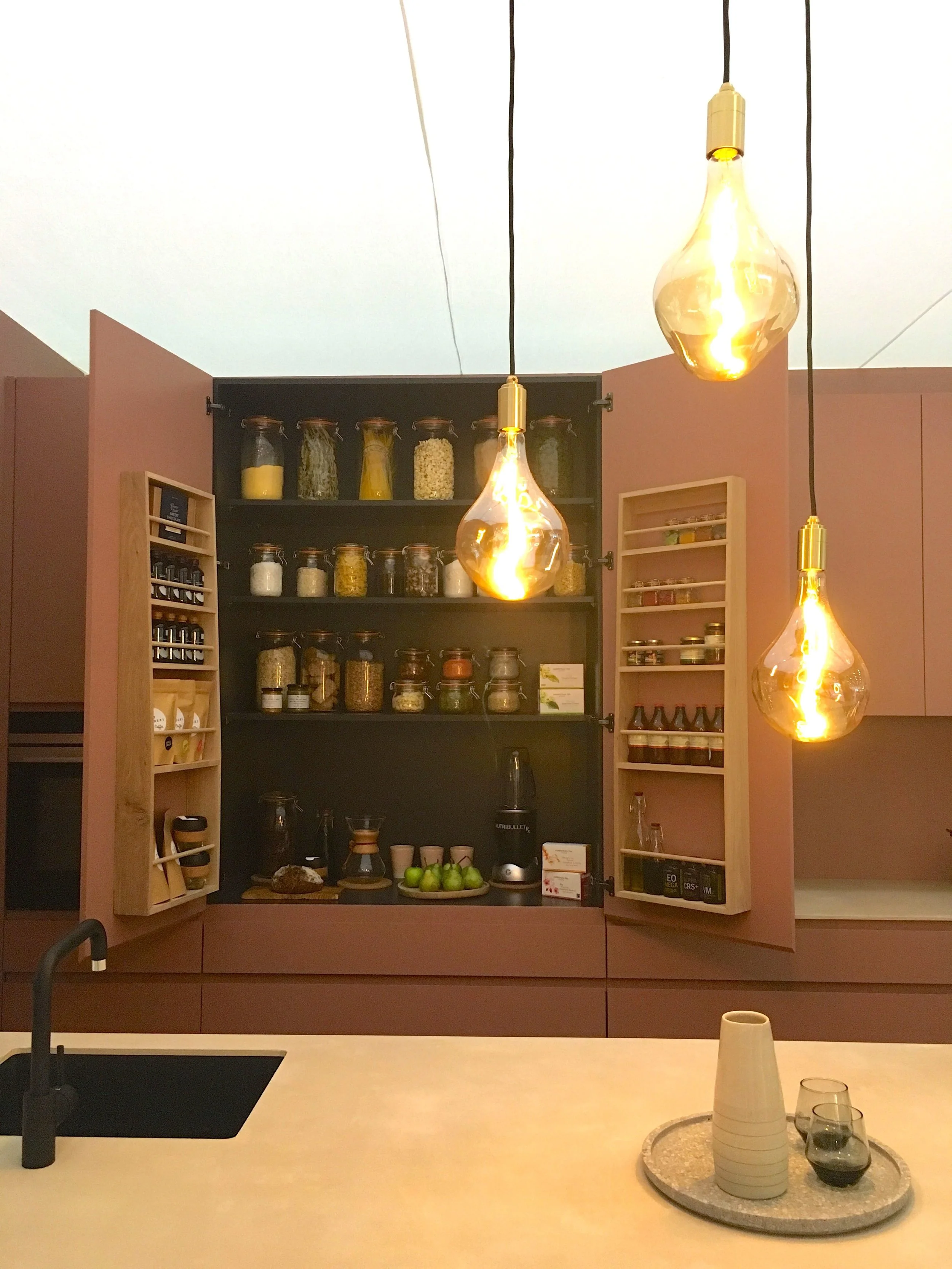 A peek into the cupboards at this roomset at Grand Designs