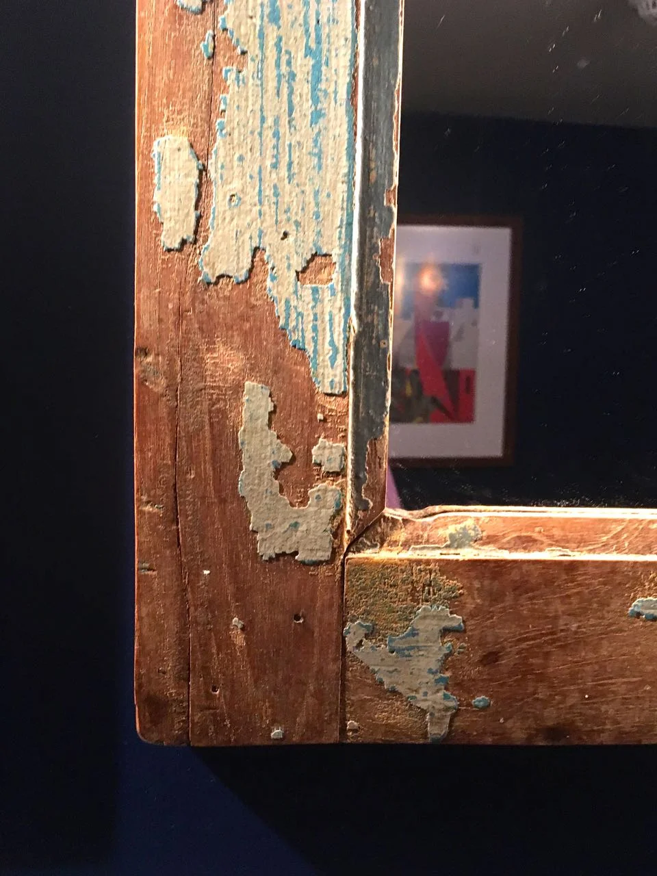 A textured corner of a picture frame