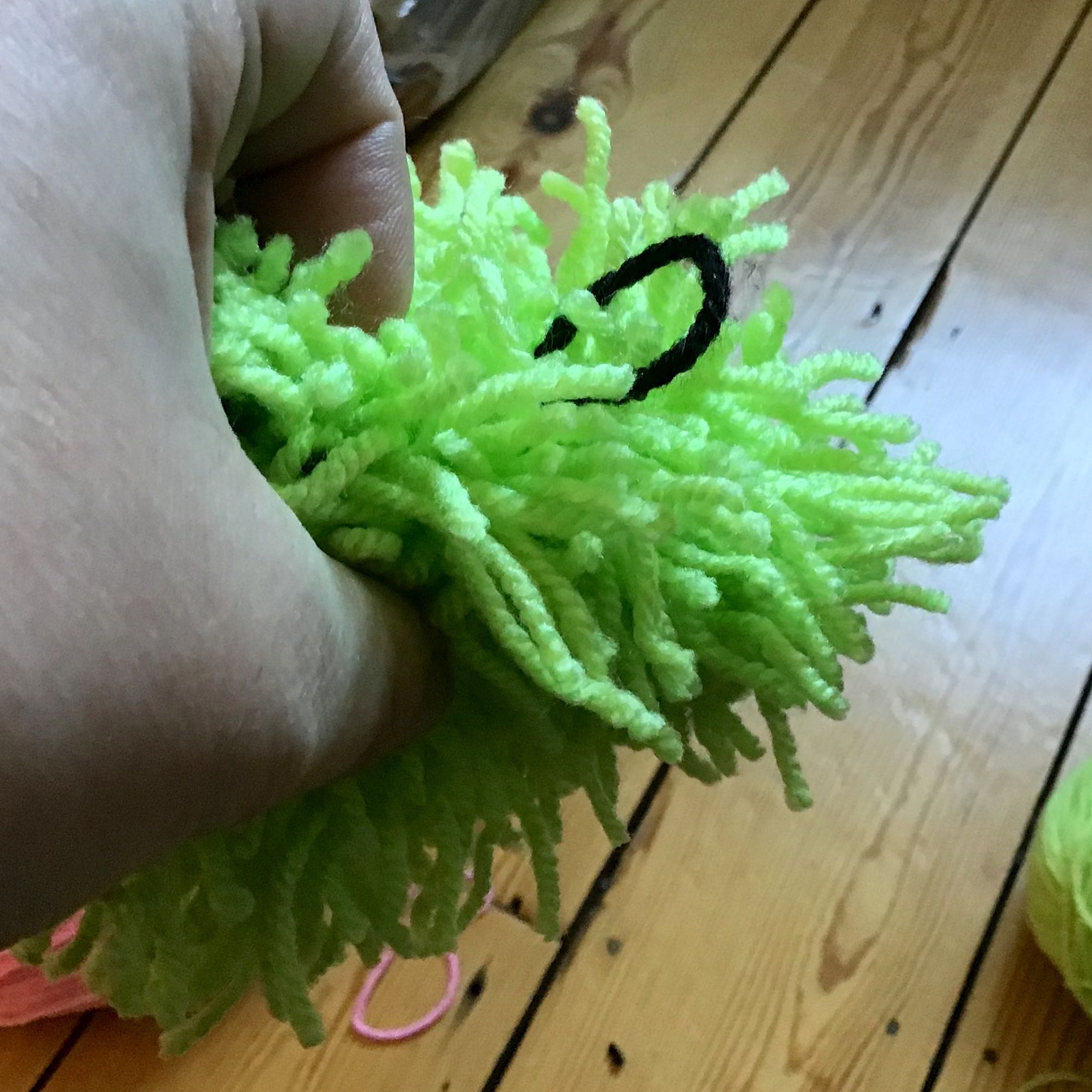 Tie a loop so you can hang your sheep up