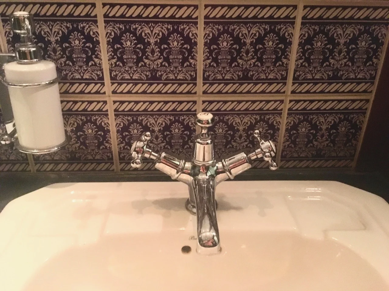 more ornate tiles above the basins